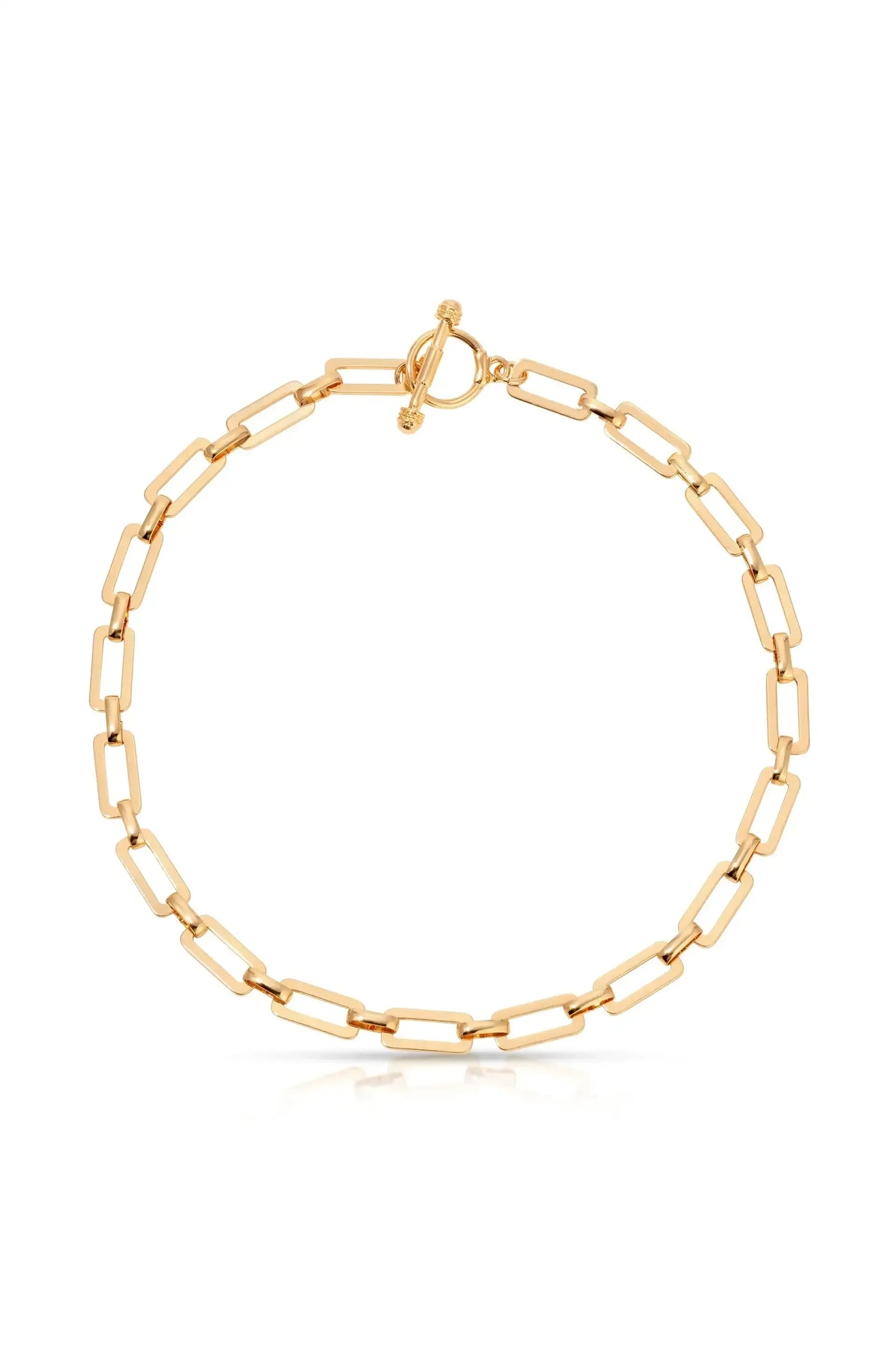 A gold chain bracelet features interlinked rectangular links. It is fastened with a decorative toggle clasp, set against a plain white background, emphasizing its shine and elegance.
