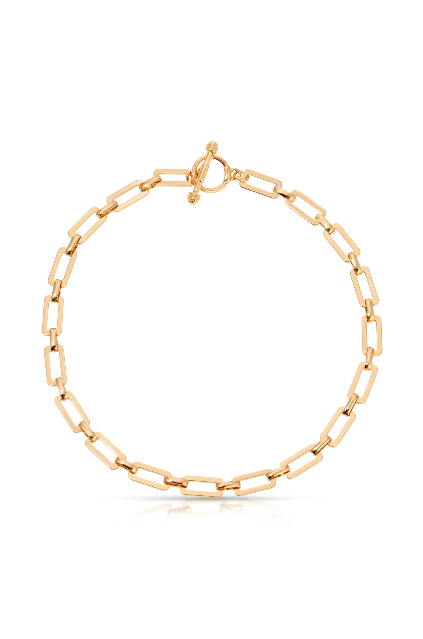 A gold chain bracelet features interlinked rectangular links. It is fastened with a decorative toggle clasp, set against a plain white background, emphasizing its shine and elegance.
