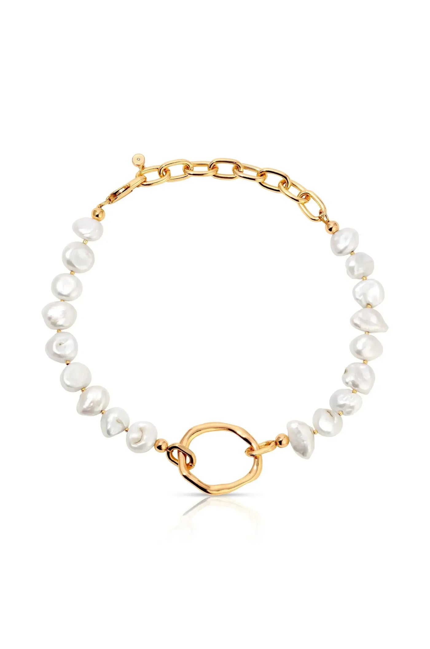 A pearl bracelet features irregularly shaped white pearls linked by gold-colored metal. The centerpiece is an oval gold clasp, set against a white background, creating an elegant display.