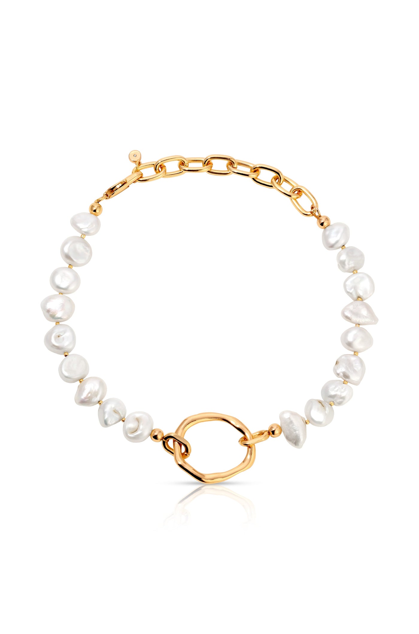 A pearl bracelet features irregularly shaped white pearls linked by gold-colored metal. The centerpiece is an oval gold clasp, set against a white background, creating an elegant display.