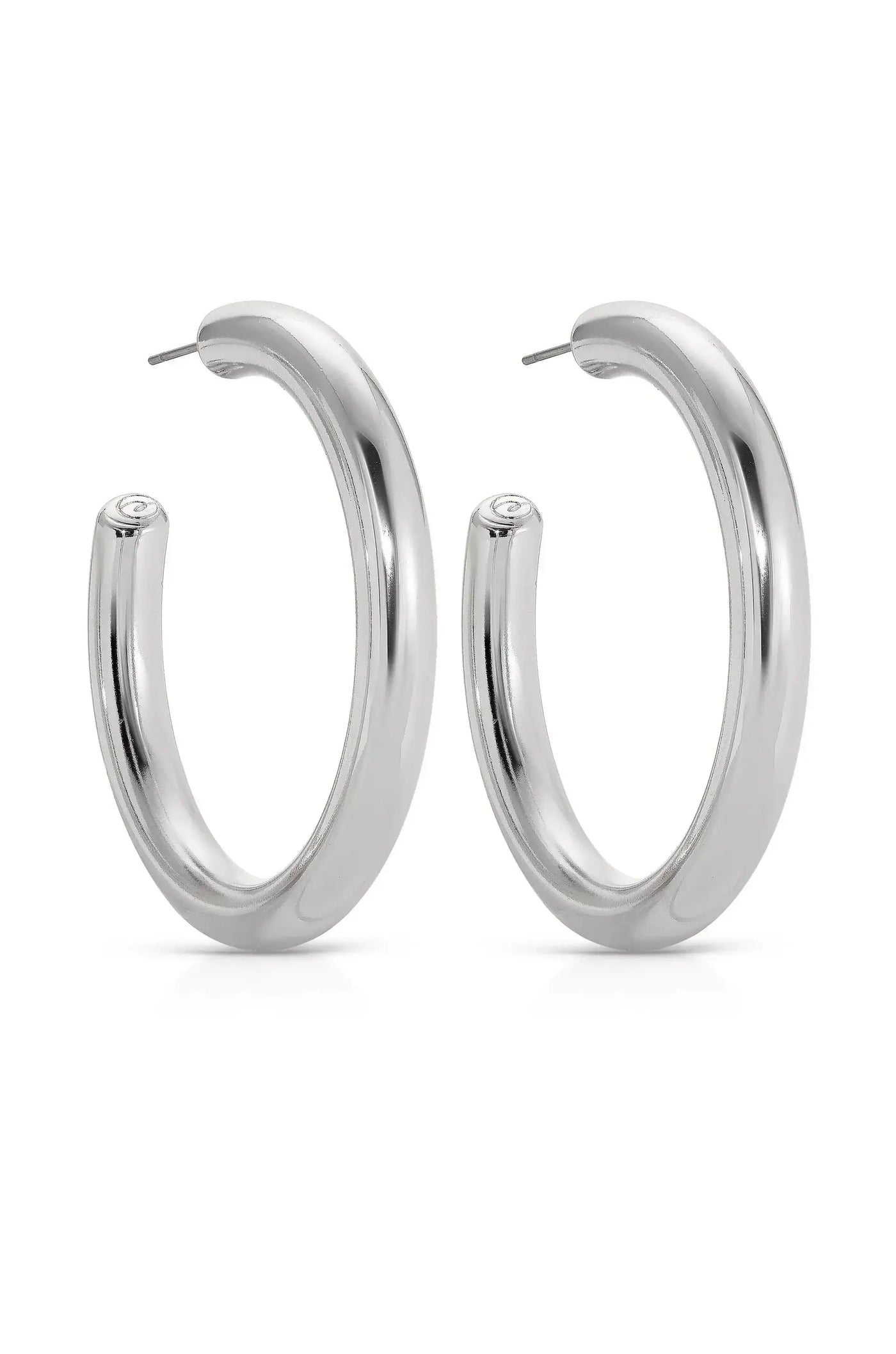 A pair of shiny silver hoop earrings is displayed together. They are circular in shape, with a smooth, reflective surface, set against a neutral white background.