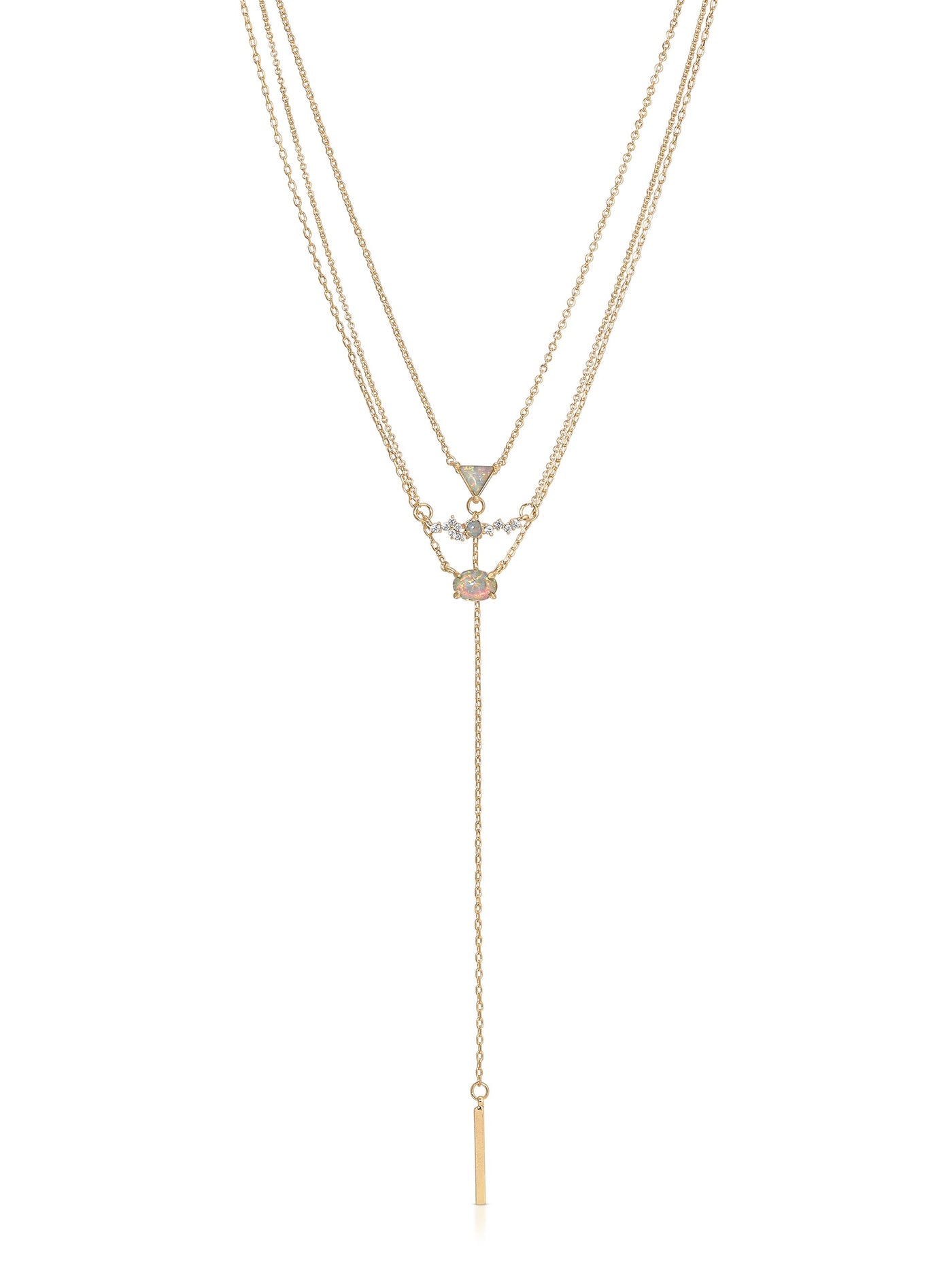 A gold layered necklace featuring three chains. The center displays an opal and diamond pendant. A vertical bar pendant hangs down, adding elegance to the piece in a simple, bright context.