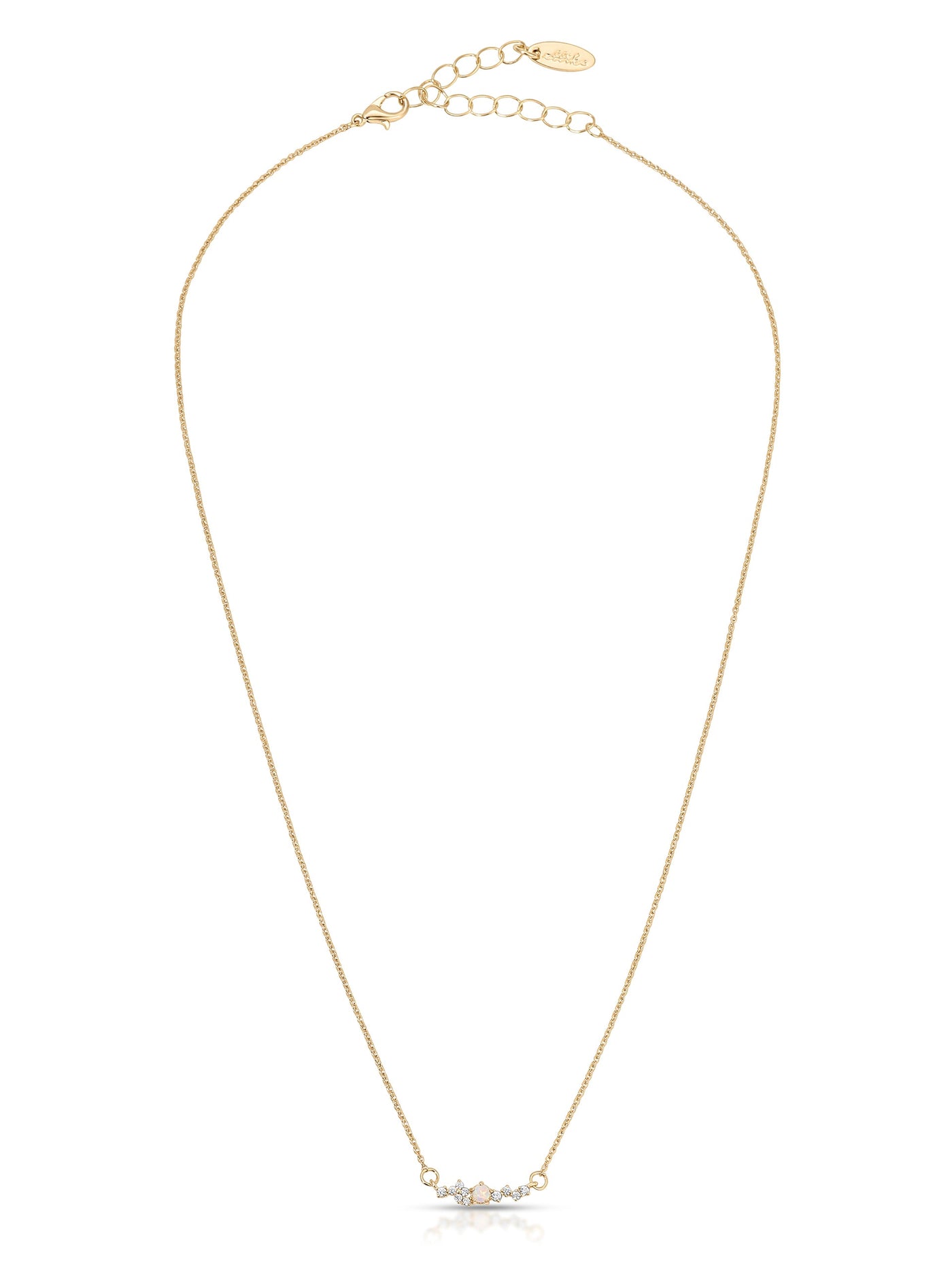 A delicate gold necklace with a fine chain features a central arrangement of small gemstones. It is displayed against a plain white background, emphasizing its elegance and design.