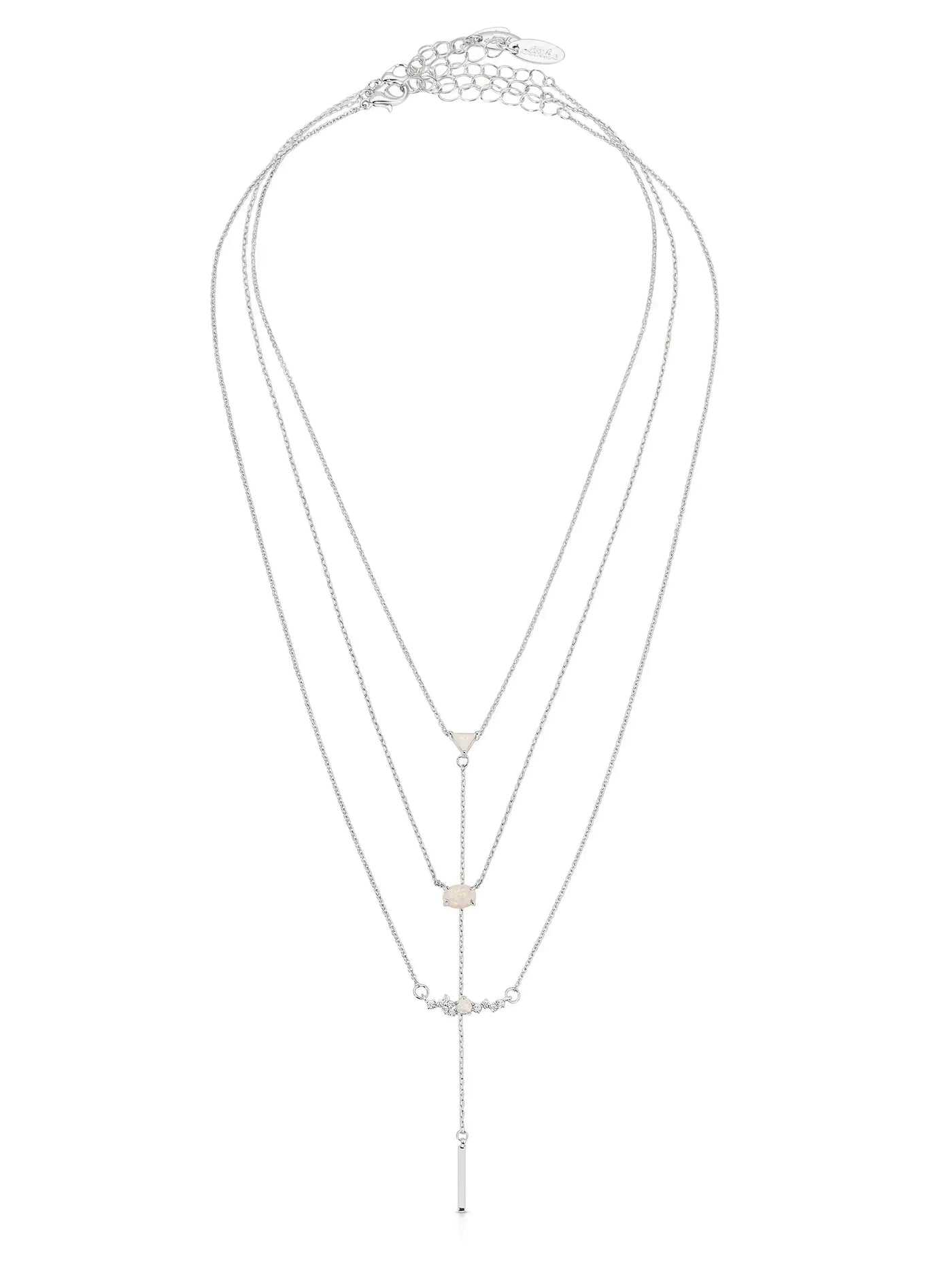 A silver layered necklace features multiple chains of varying lengths with geometric stones, hanging elegantly from a delicate clasp, set against a neutral background.