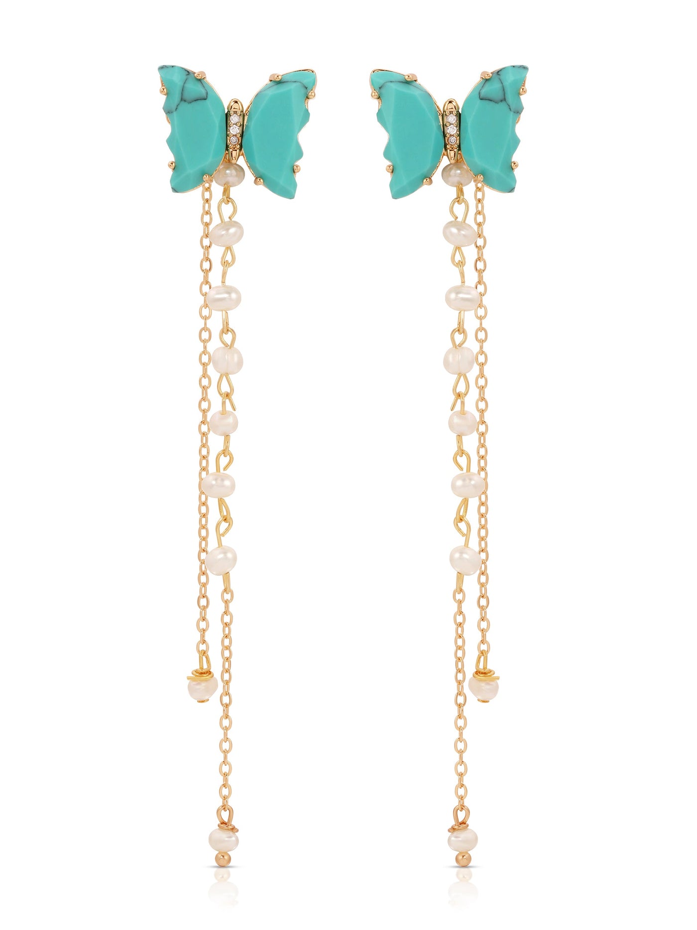 Turquoise butterfly-shaped earrings feature dangling chains adorned with small pearls, creating a whimsical and elegant accessory suitable for various occasions. The gold accents enhance their charm.