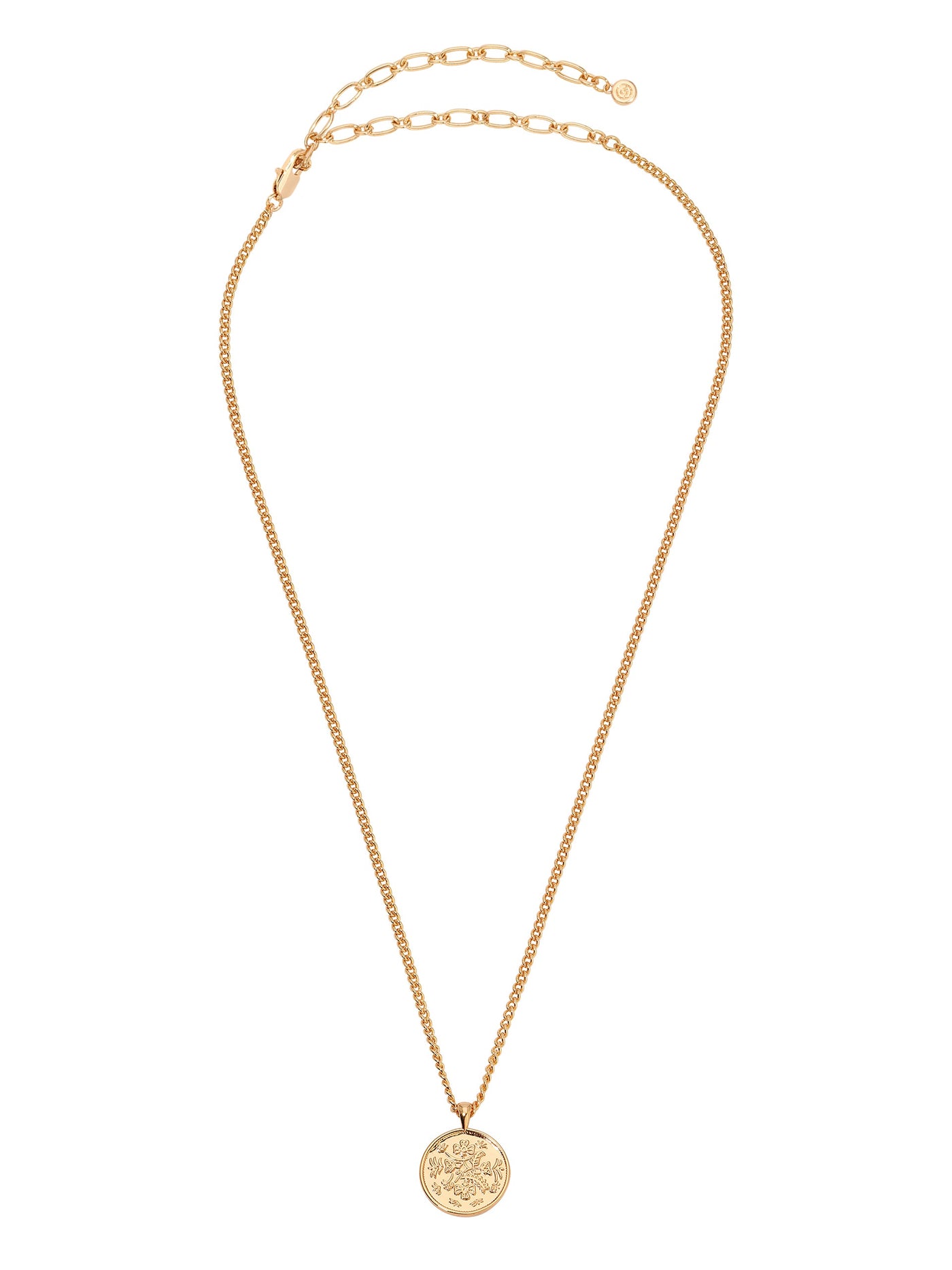 A gold necklace features a delicate chain and a round pendant with intricate floral designs. The pendant hangs prominently, shining in a light setting that enhances its elegance.