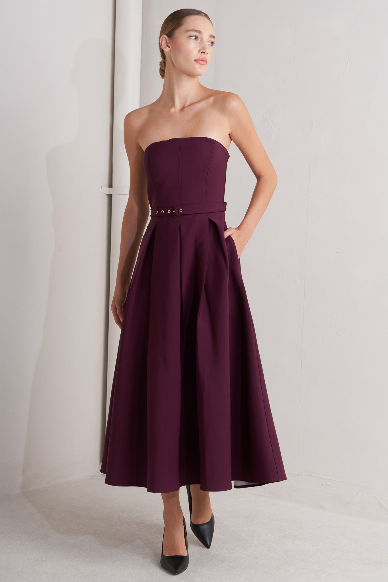 Strapless burgundy dress with a belt