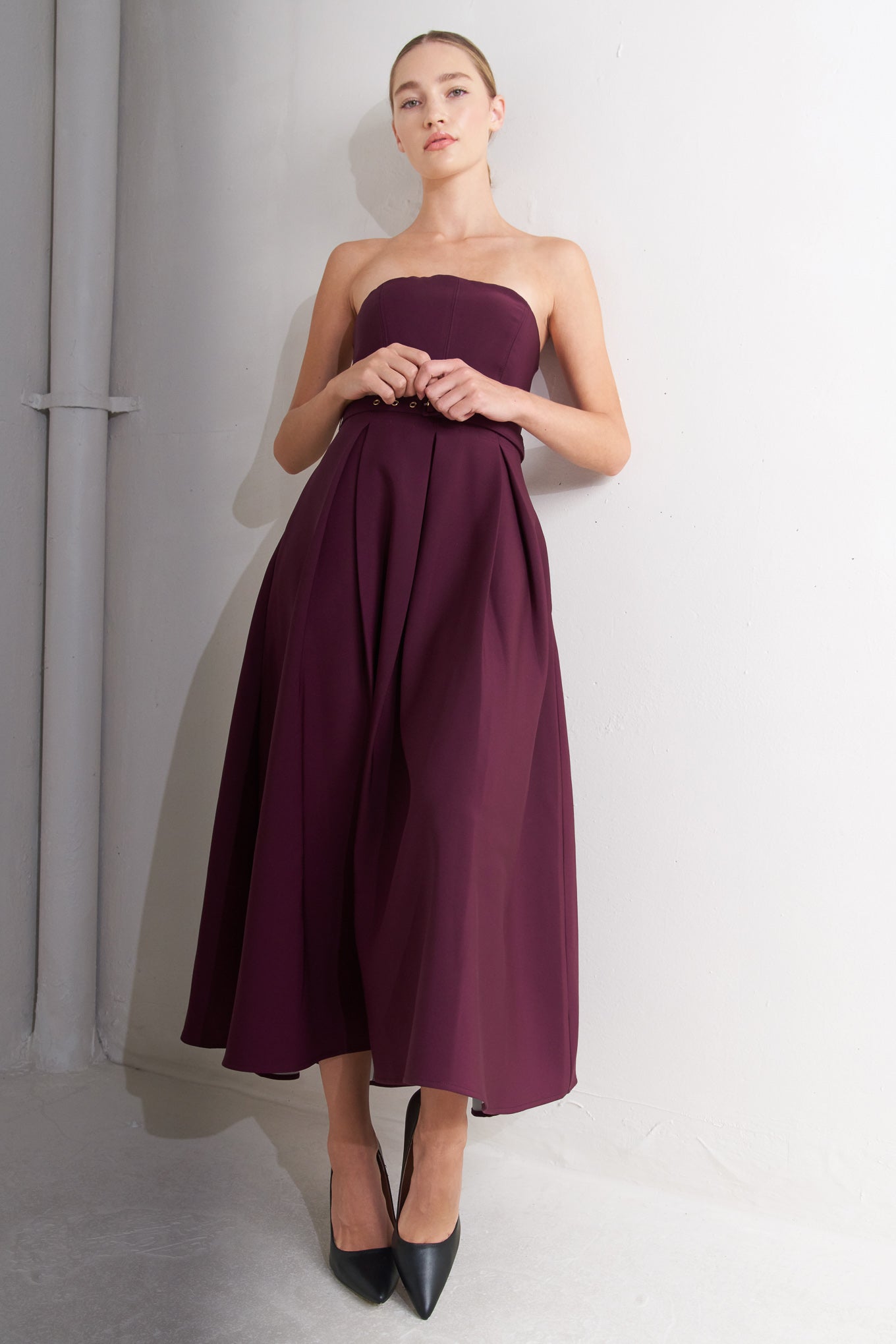Strapless burgundy dress with a belt