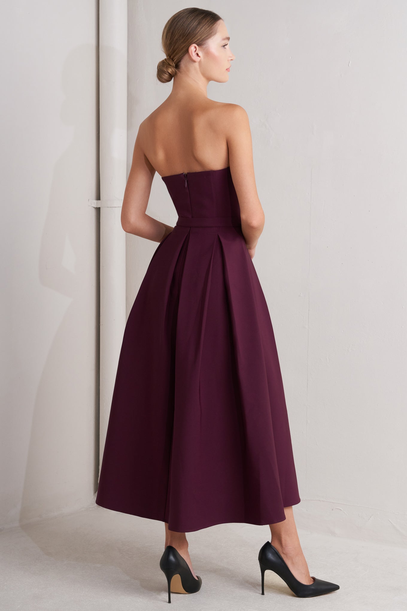 Strapless burgundy dress with a belt