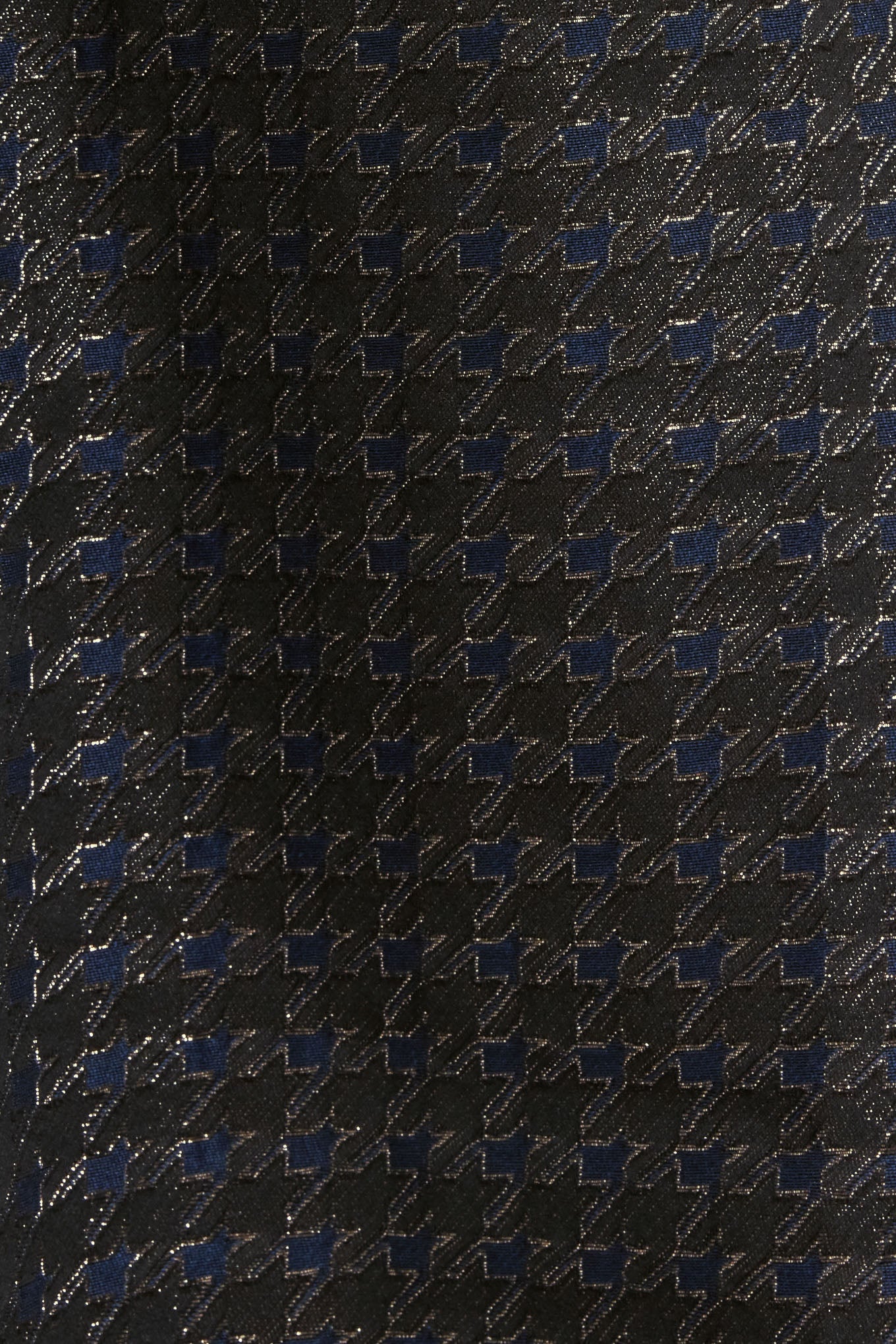 Dark patterned fabric with small geometric shapes