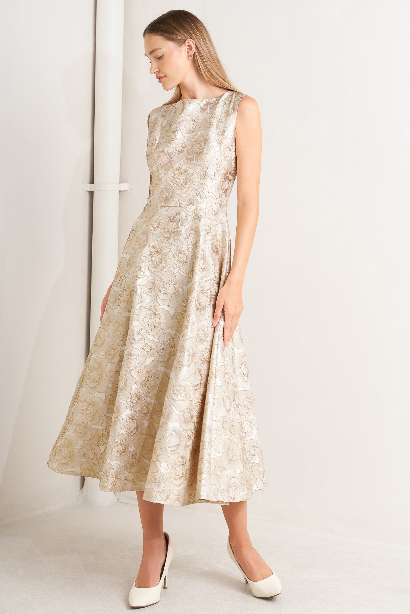 Beige floral dress against