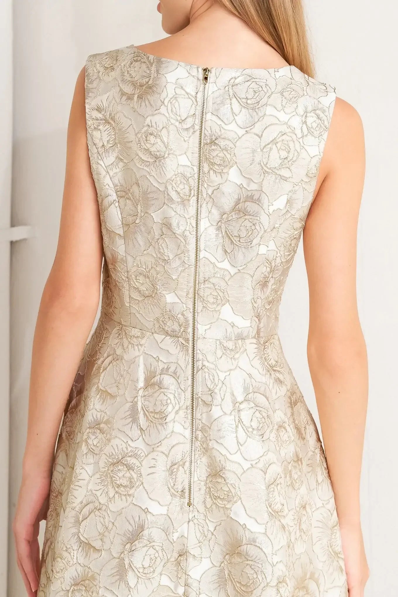 Beige floral dress against