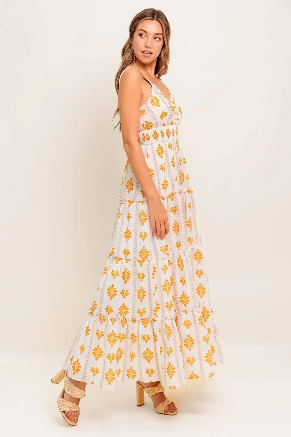 White dress with yellow floral patterns