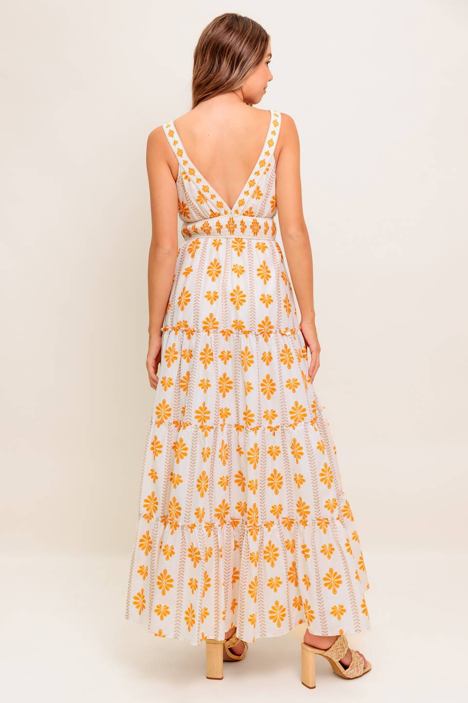 White dress with yellow floral patterns