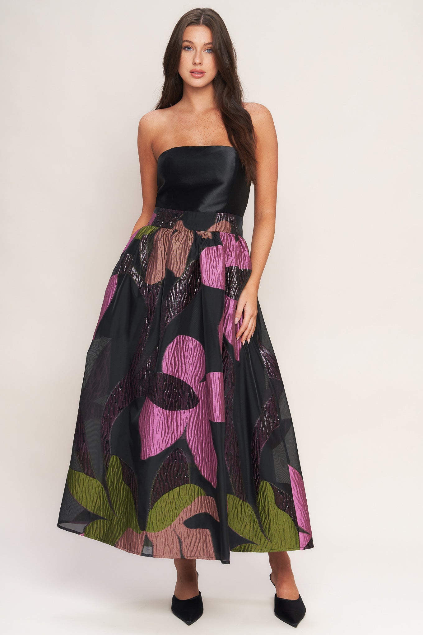Woman strapless black dress with floral pattern