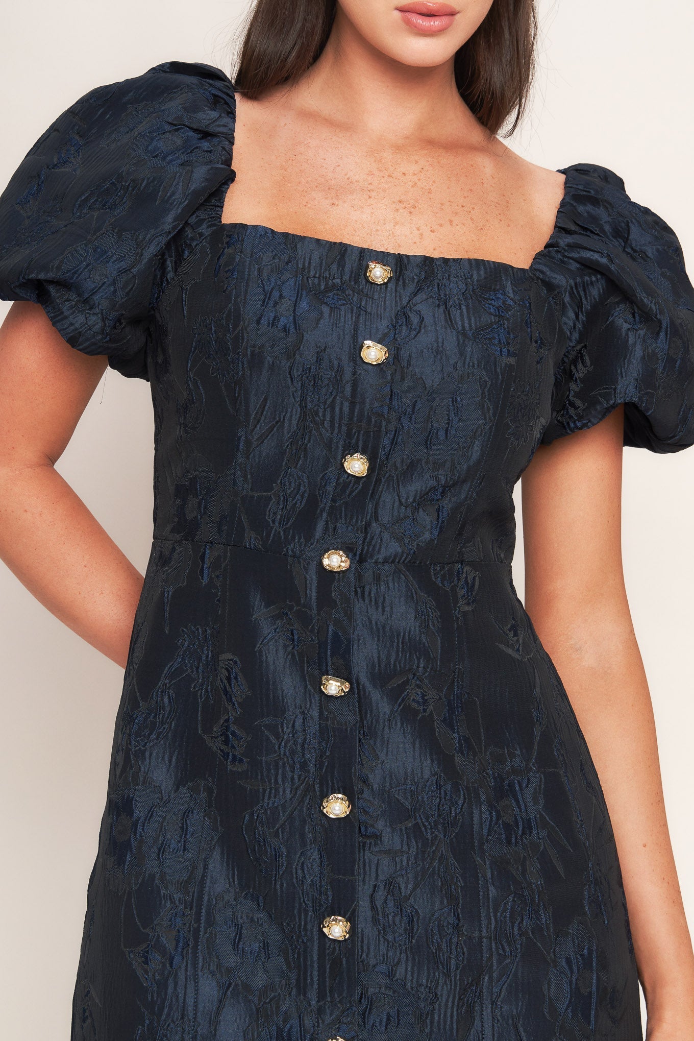 Dark blue dress with puff sleeves