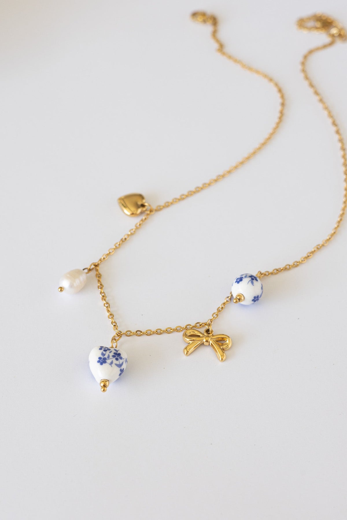 Blue and White Porcelain Charm Necklace, product view | Lady Black Tie