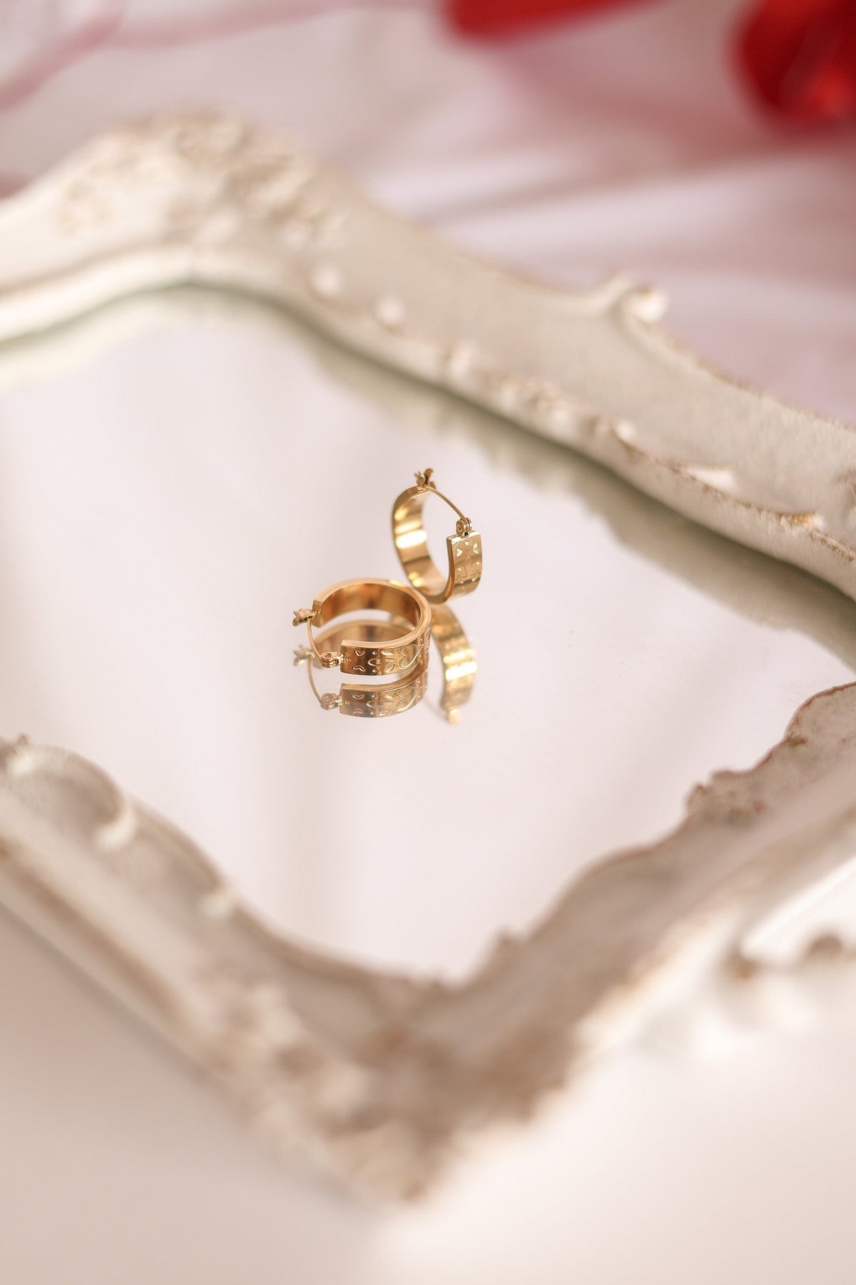Heart Engraved Chunky Hoop Earrings in Gold, styled flat lay | Lady Black Tie