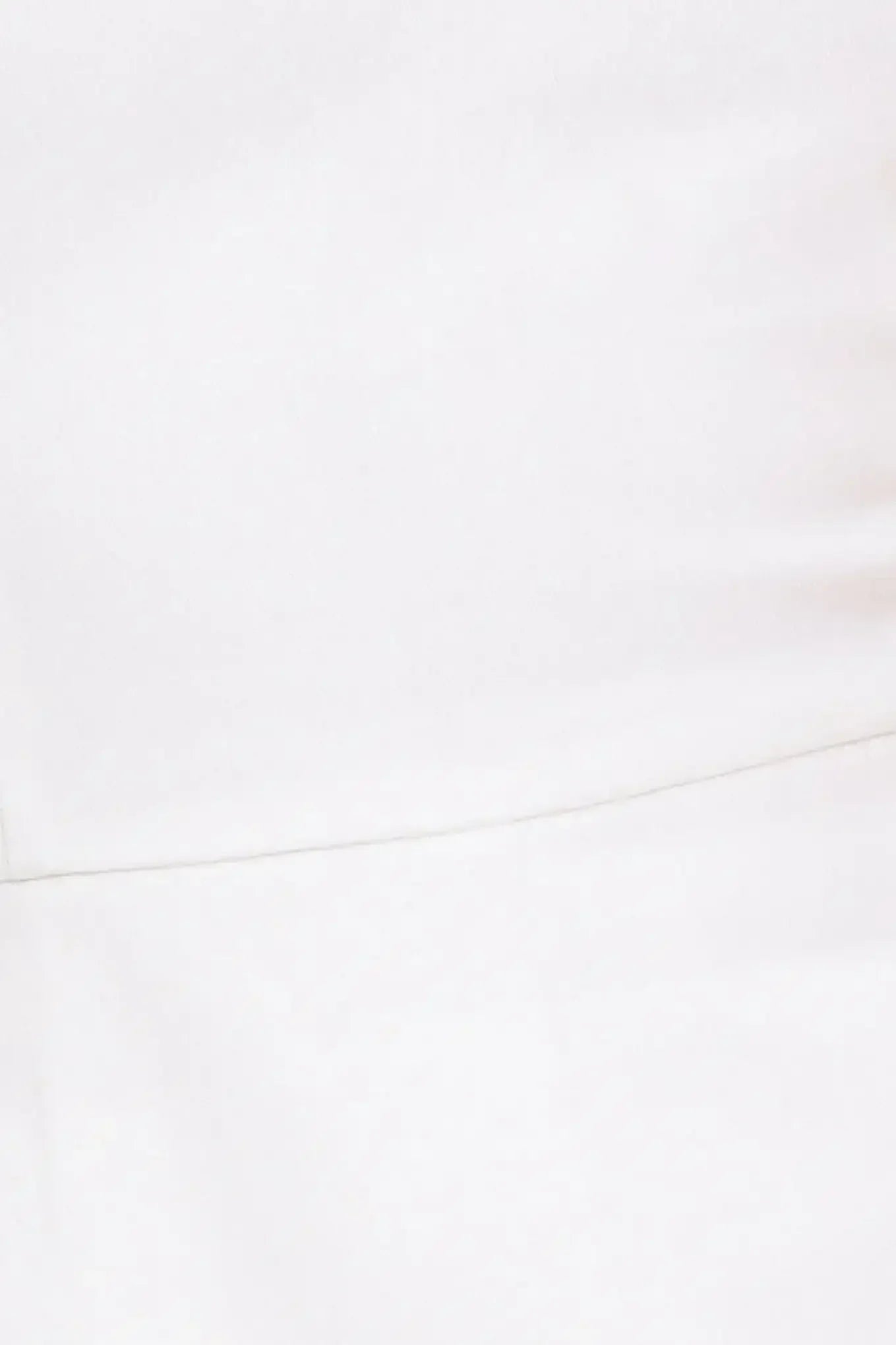 EXPLORING NEW CITIES - WHITE DENIM RUFFLE SKORT ROMPER