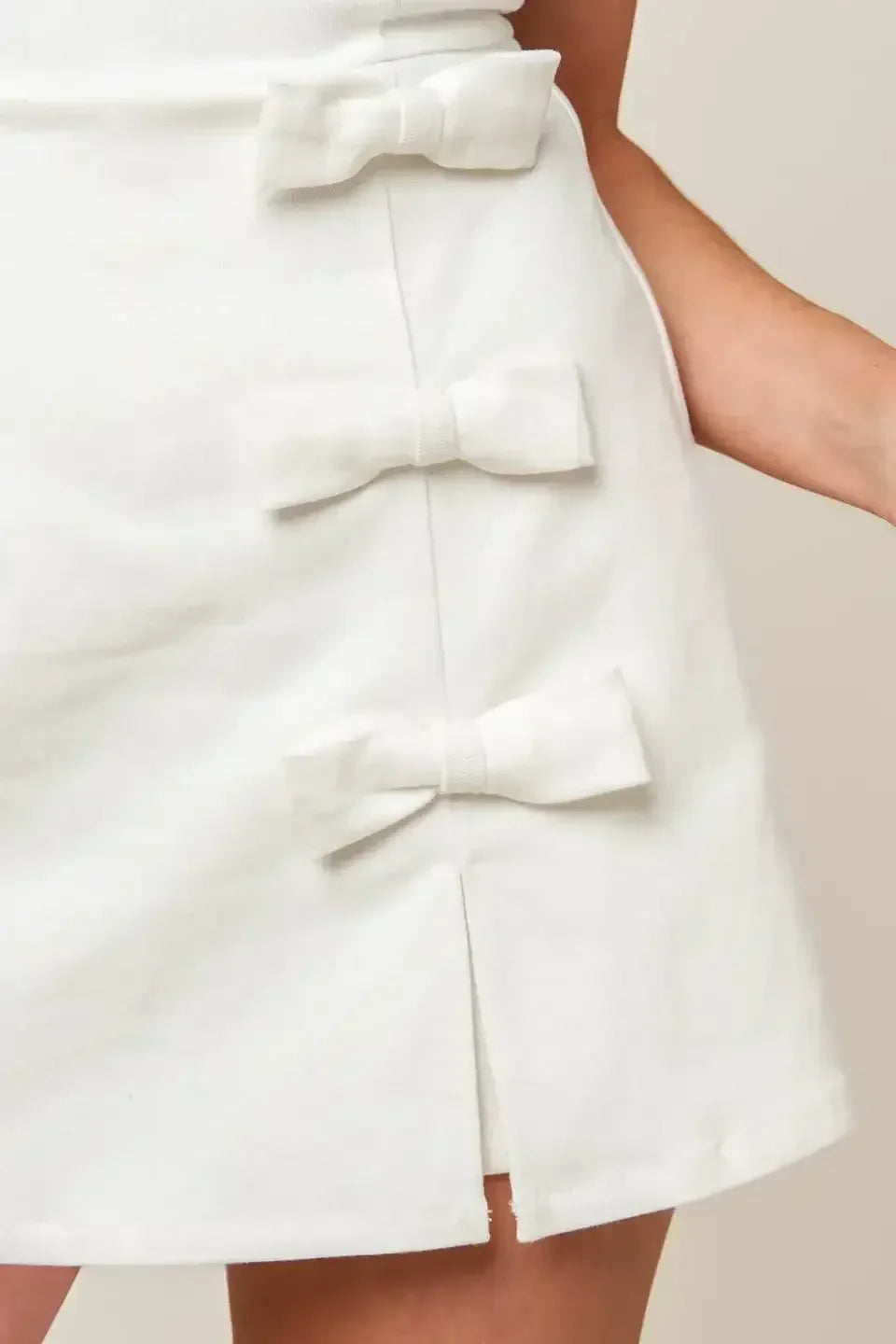 OPEN MINDED - WHITE DENIM BOW TRIM SKORT ROMPER