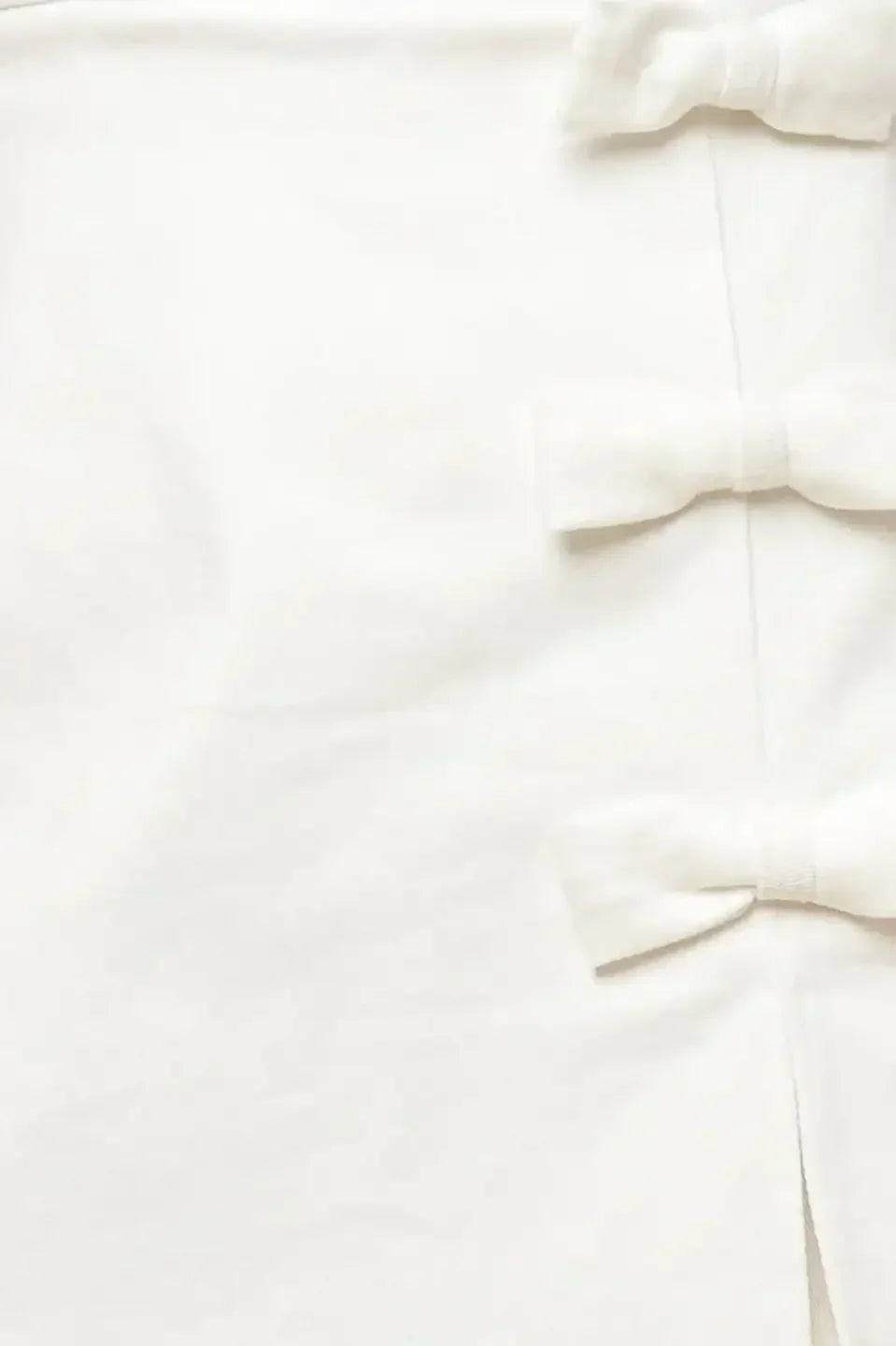 OPEN MINDED - WHITE DENIM BOW TRIM SKORT ROMPER