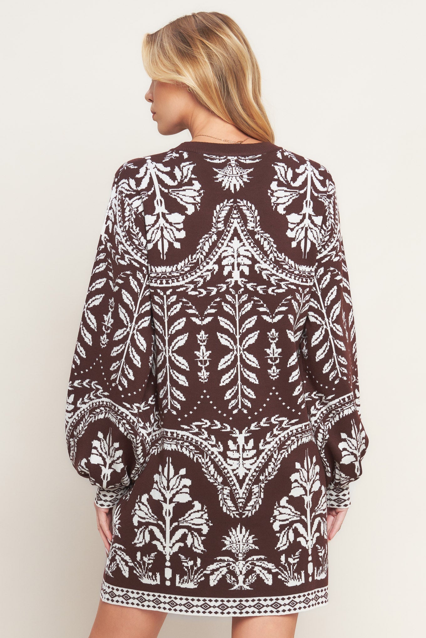 Patterned dress with beige boots