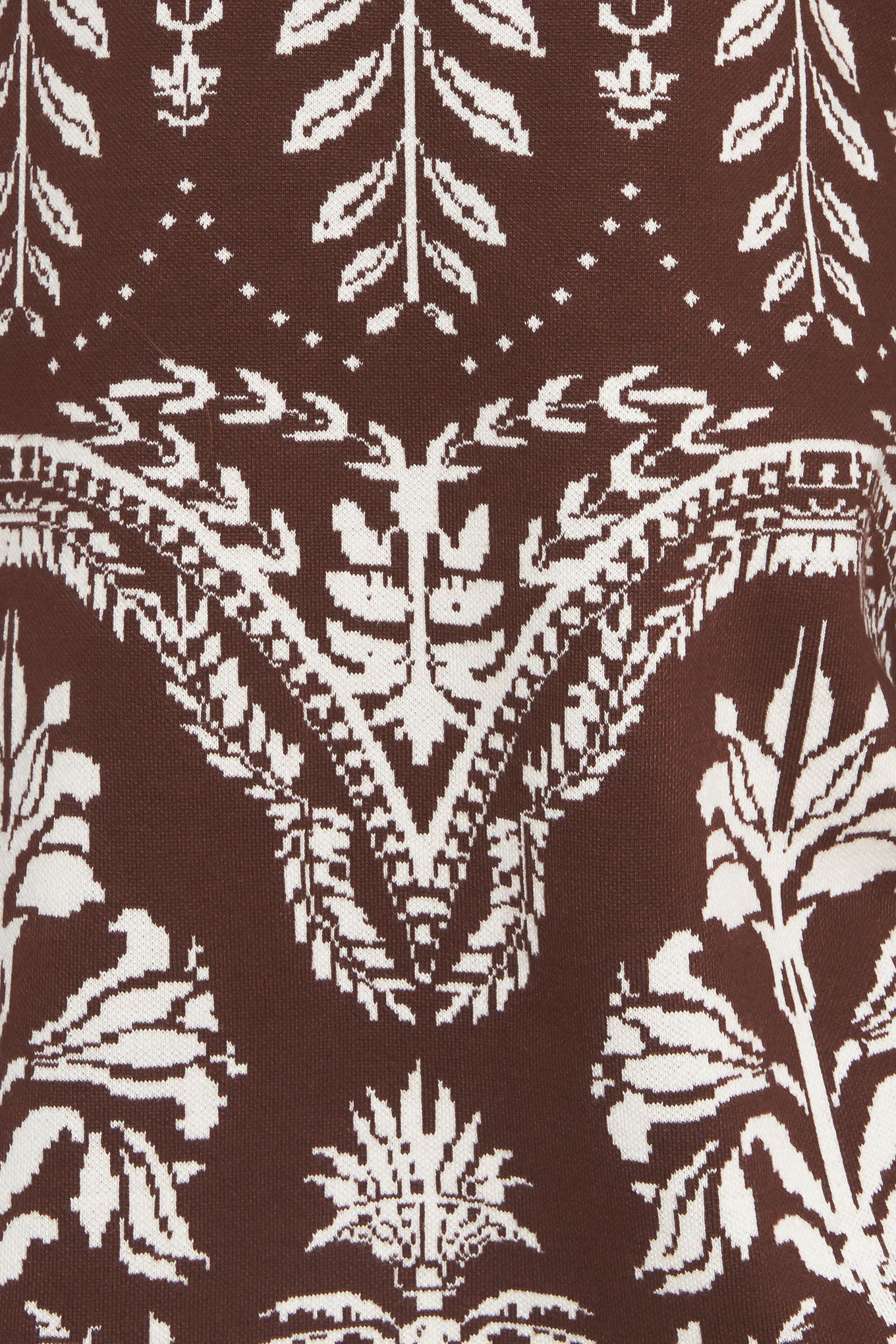 Patterned dress with beige boots