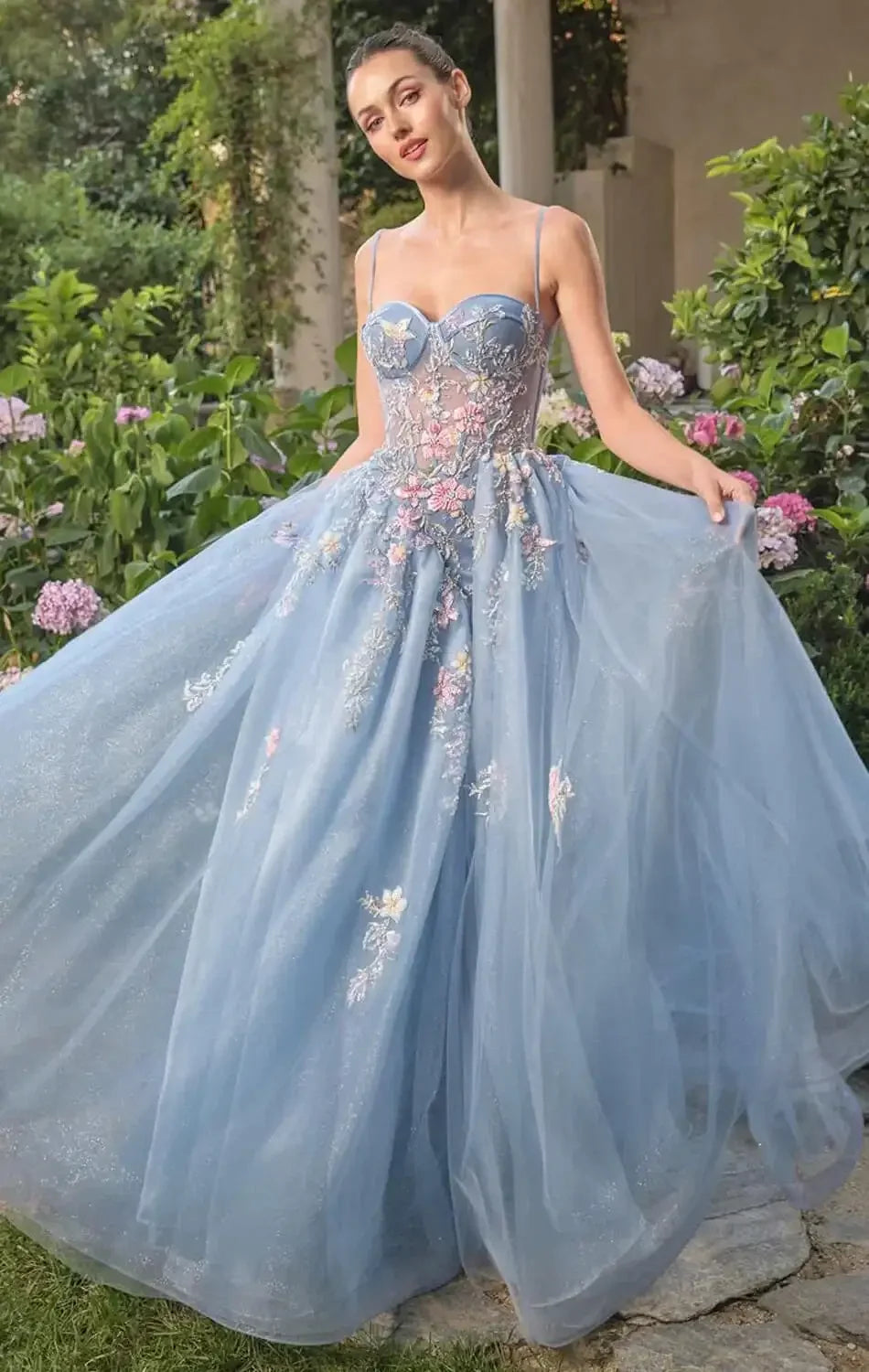 Light blue evening gown with floral embroidery