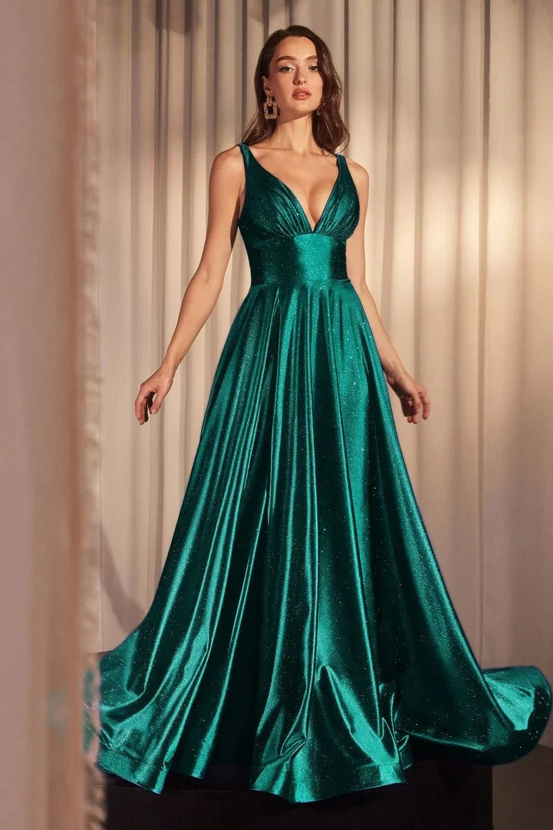 Model stands in Emerald Ball Gown