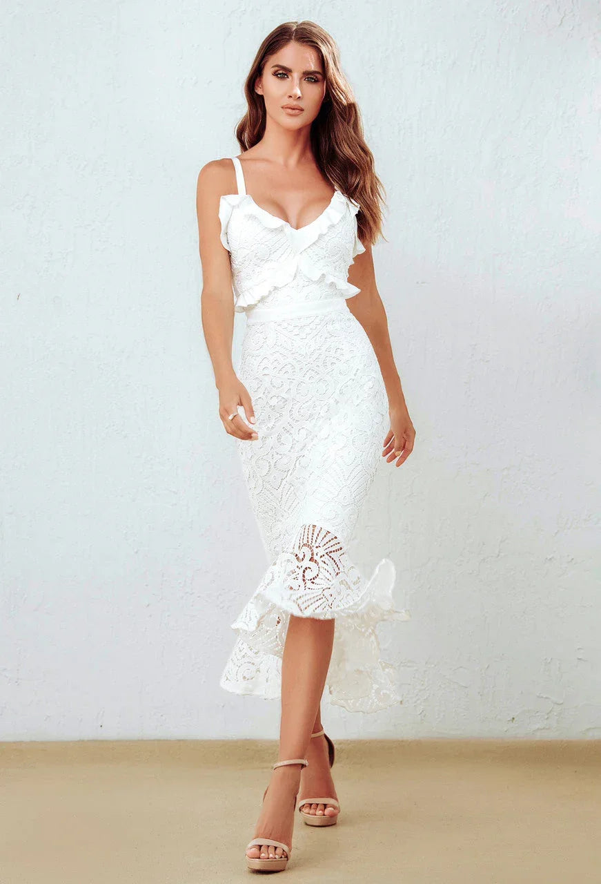 Model walks in White Lace Midi Dress