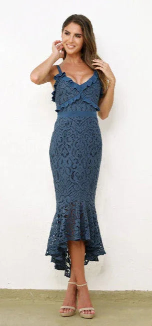 Fitted steel blue midi dress styled with strappy heels