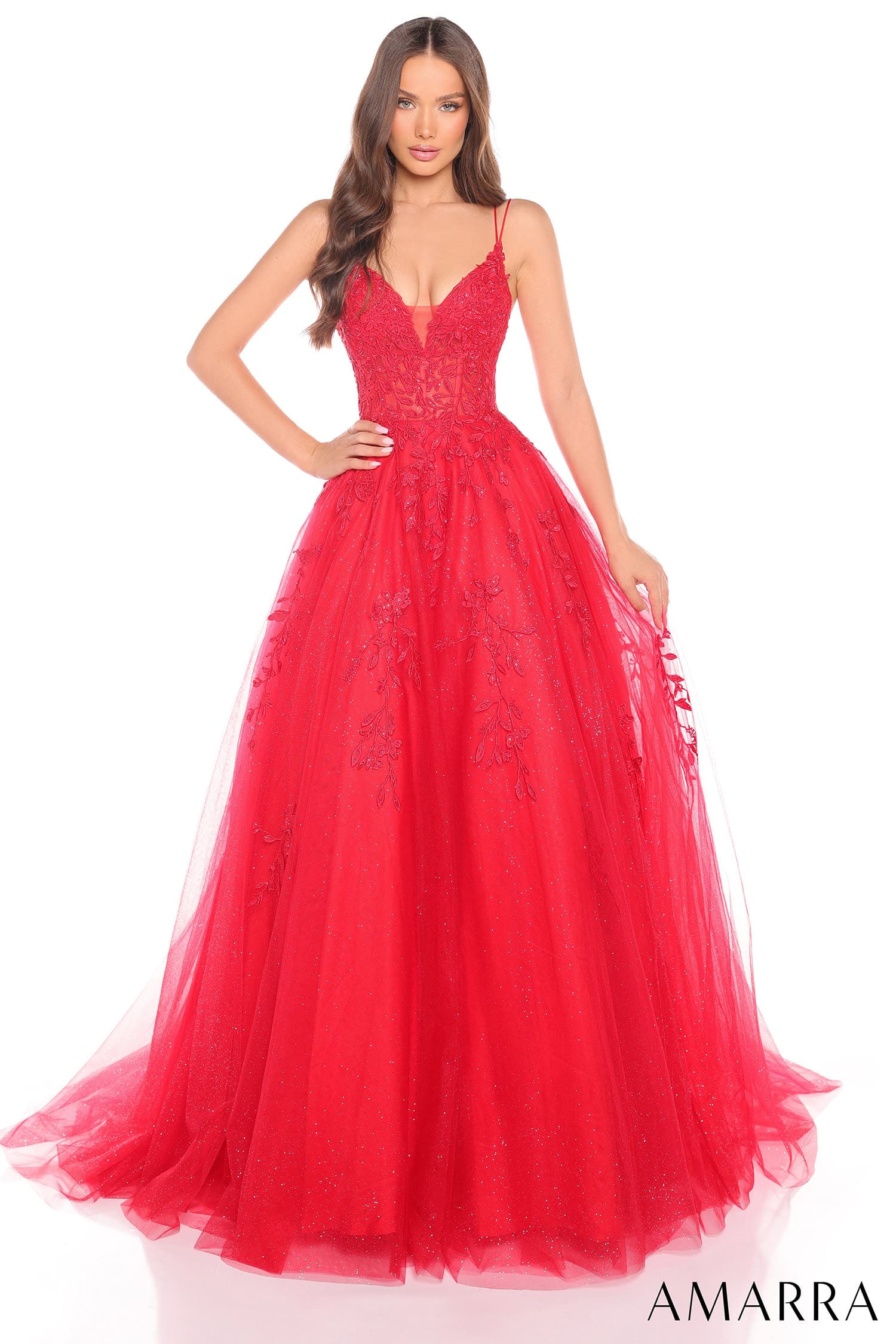 Red evening gown with intricate detailing on a white background, featuring the brand 'AMARRA'.