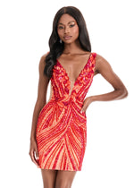 Woman wearing a red and orange sequin dress on a white background
