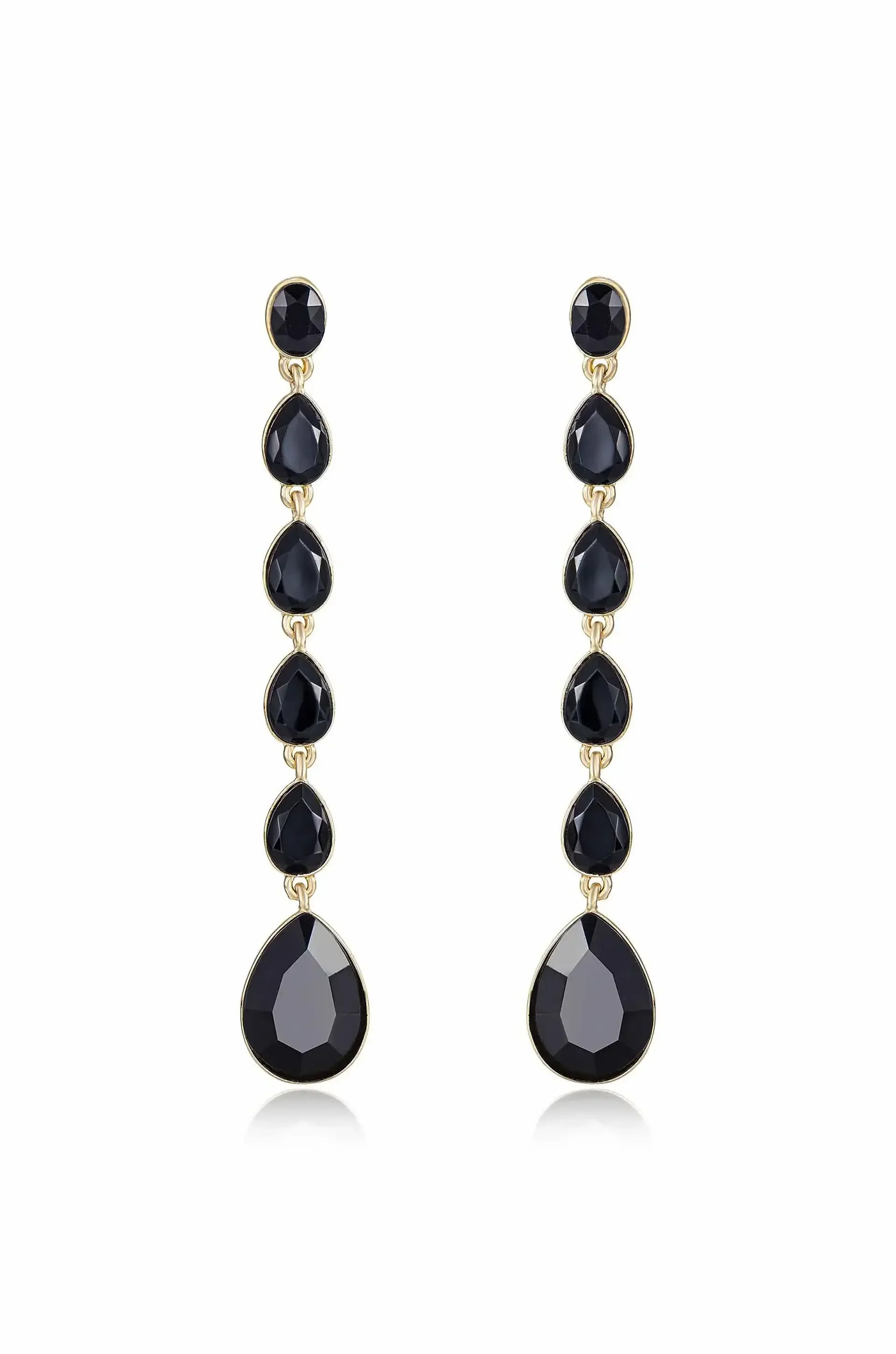 Elegant drop earrings feature a vertical arrangement of black stones, including faceted round and teardrop shapes, all set in a gold-tone metal, creating a sophisticated accessory.