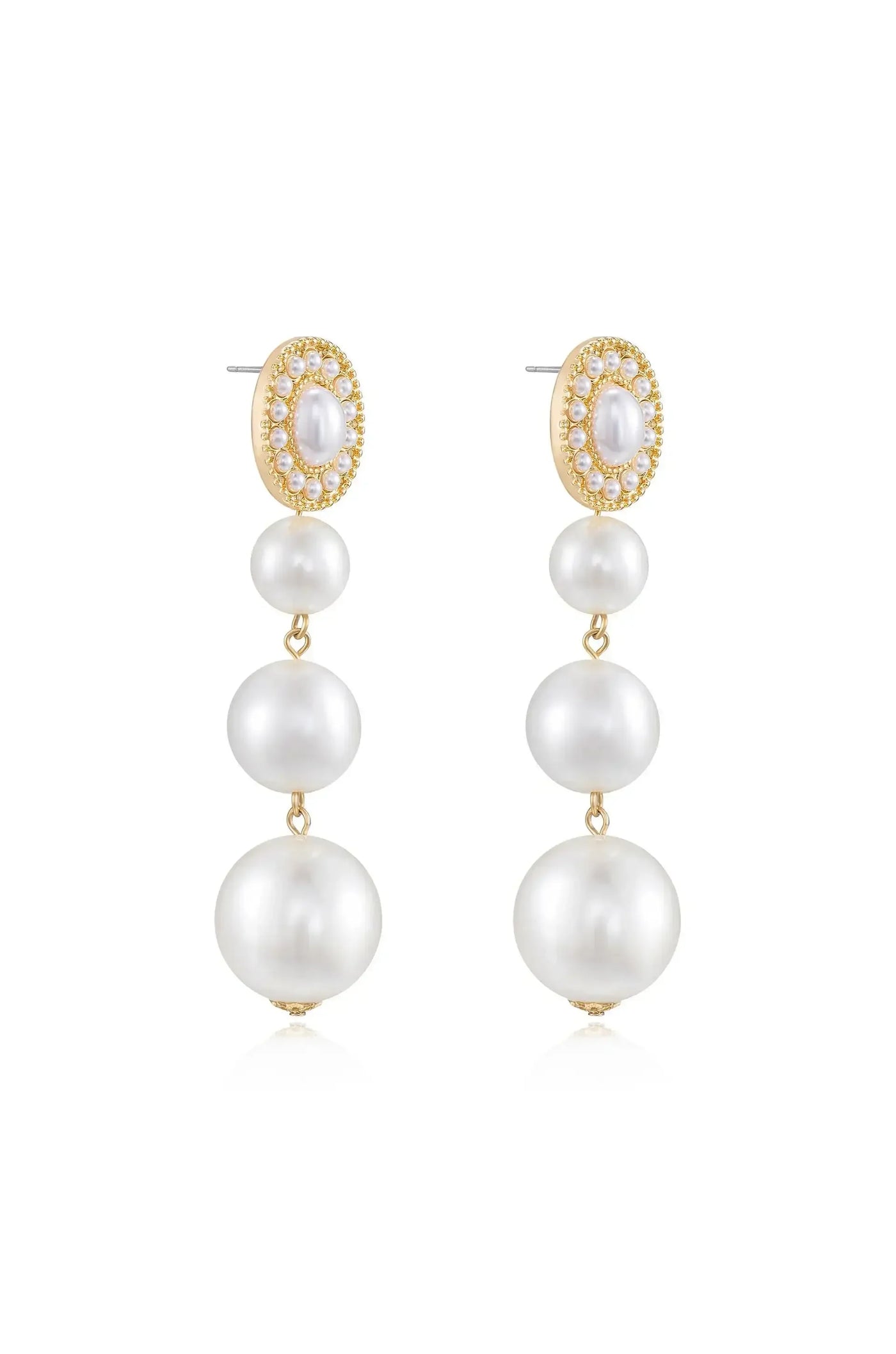 Elegant earrings featuring a cluster of pearls and a gold oval setting. The pearls are arranged in a descending pattern, capturing light and reflecting sophistication.