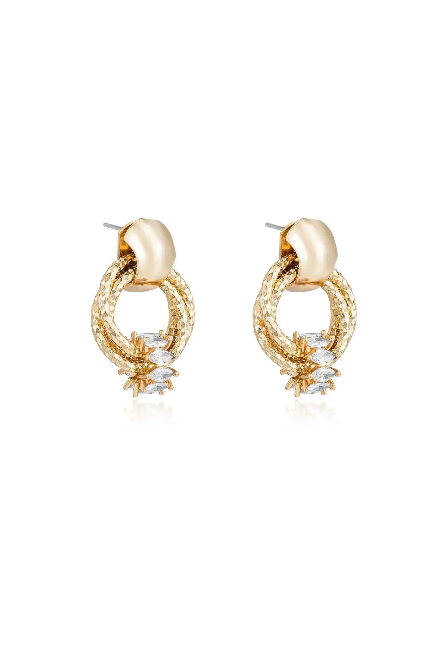 Gold earrings are displayed with a textured design featuring intertwined loops and sparkling stones at the base. The background is plain white, highlighting the jewelry's intricate details.
