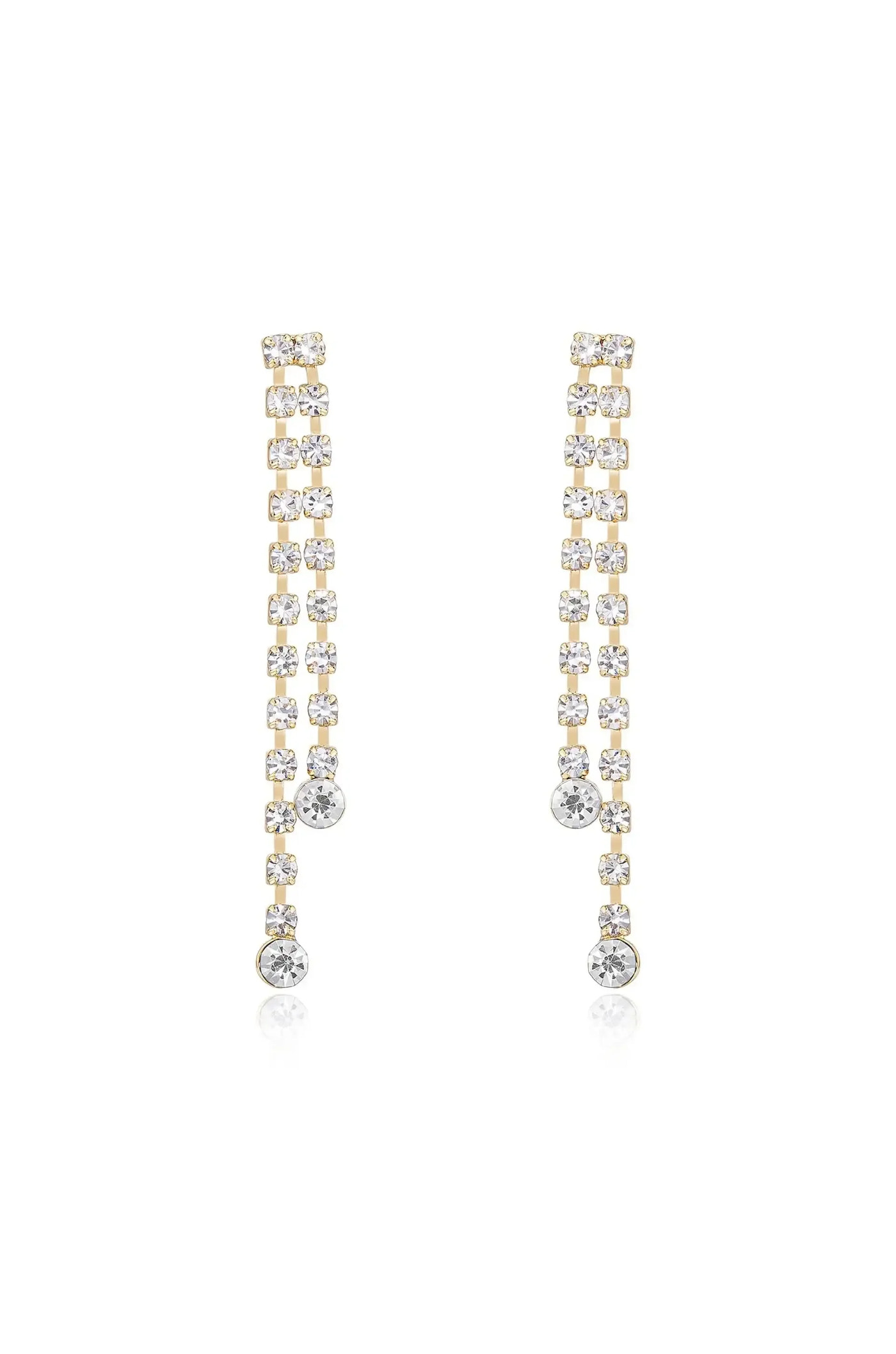 Elegant earrings featuring a series of shimmering clear crystals arranged in a vertical line, hanging gracefully, with a golden base reflecting light against a bright background.