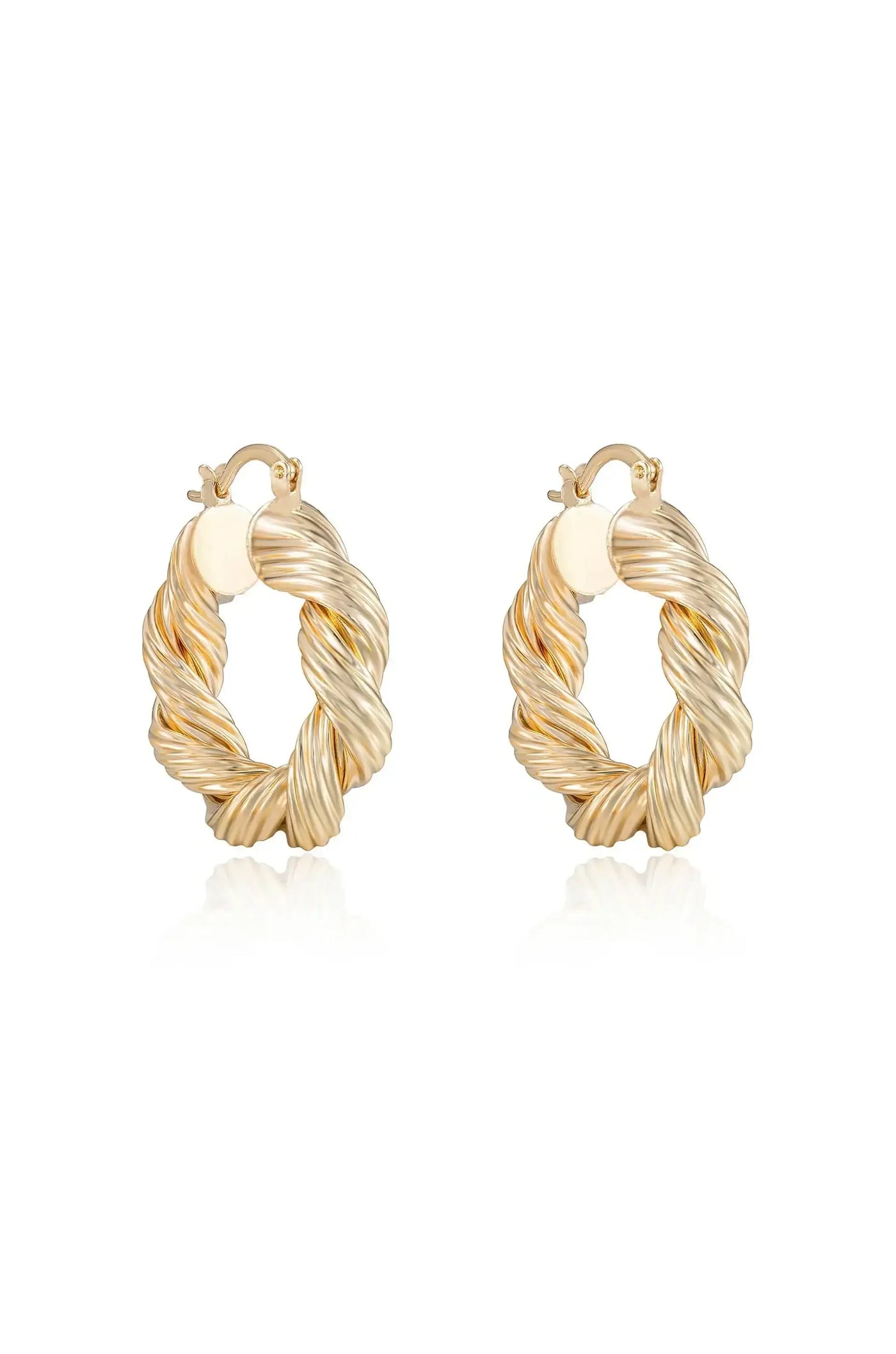 Gold hoop earrings are displayed, featuring a twisted design that creates a textured appearance. They are positioned on a white background, accentuating their reflective surface and elegant style.