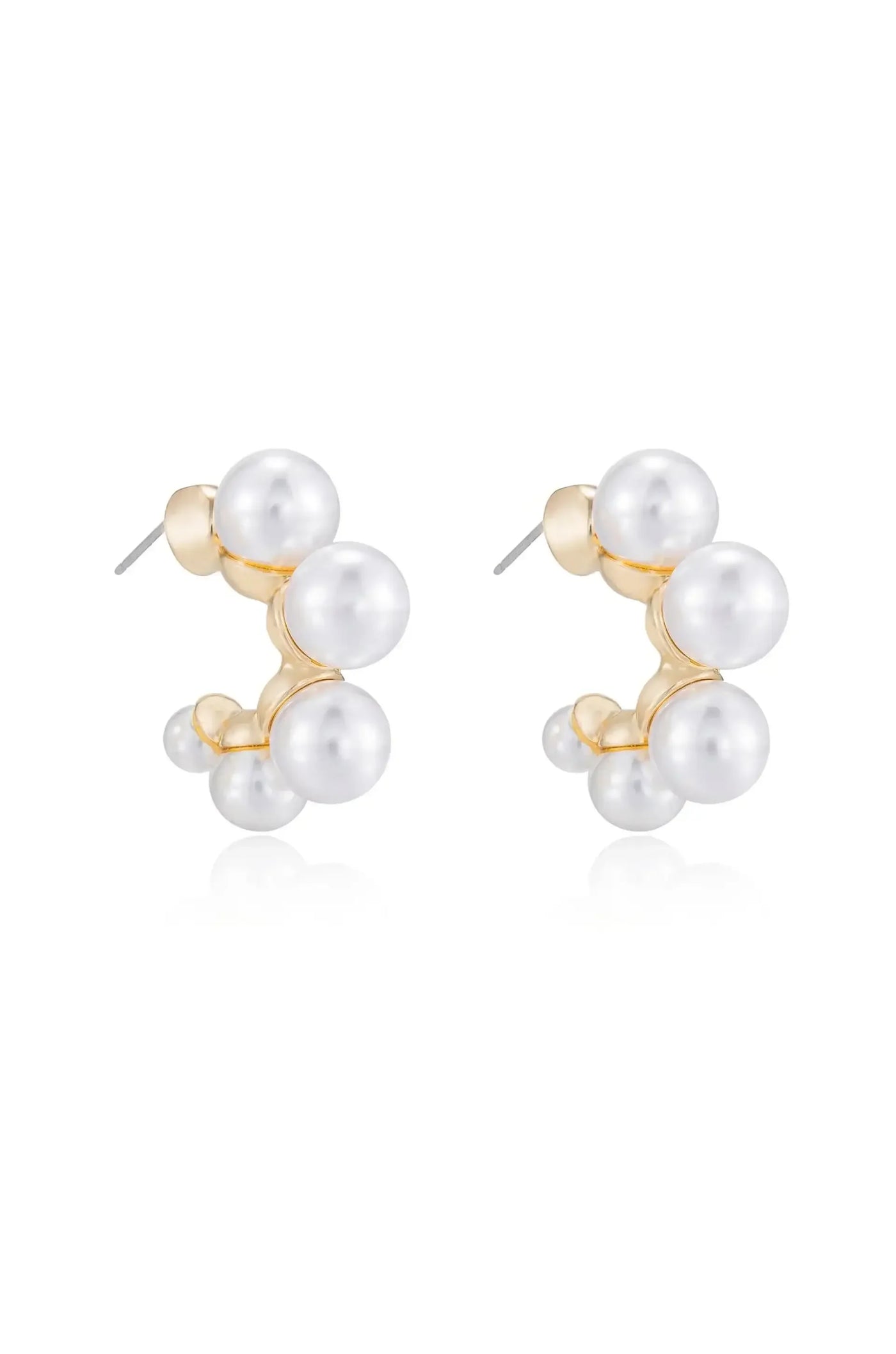 Two pearl earrings are displayed, featuring multiple spherical pearls in varying sizes connected by a gold frame. The background is white, enhancing the earrings' elegance and shine.