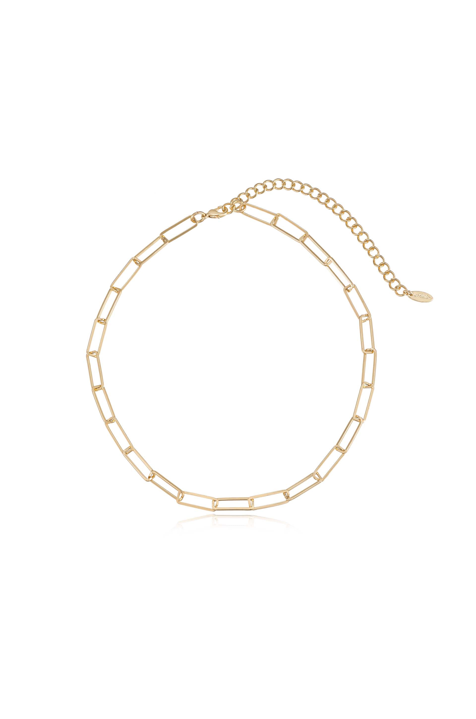 A delicate gold chain necklace features rectangular links, creating an elegant design. It has an adjustable clasp with a decorative chain extension, suitable for various neck sizes.