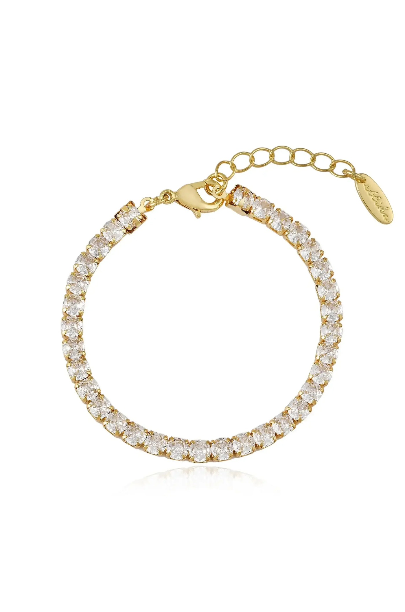 A gold bracelet adorned with sparkling clear stones is displayed, featuring a clasp and an extension chain, emphasizing its elegant design and luxurious appeal in a clean, white background.