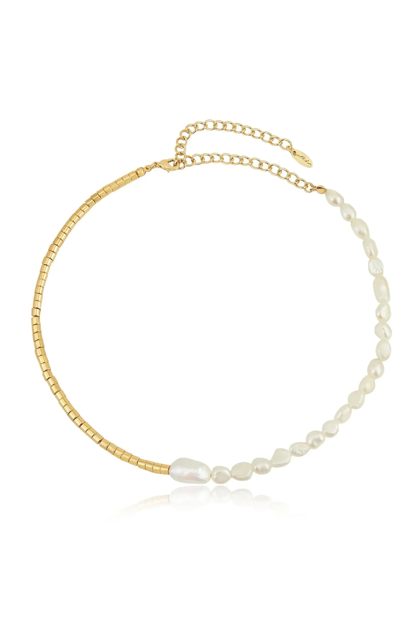 A delicate necklace features alternating sections of small gold beads and irregularly shaped white pearls. It is displayed against a light background, highlighting its elegance and shine.