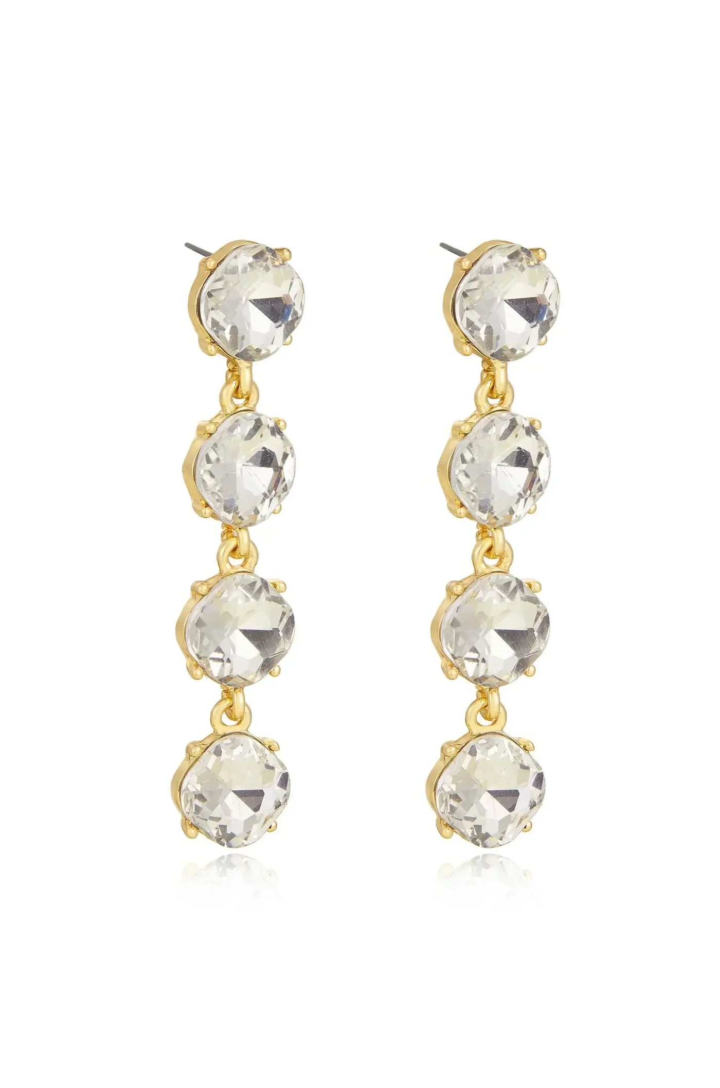 Dangling earrings made of gold-tone metal feature three large, round, faceted crystals stacked vertically. They reflect light and add sparkle, suitable for formal or festive occasions.