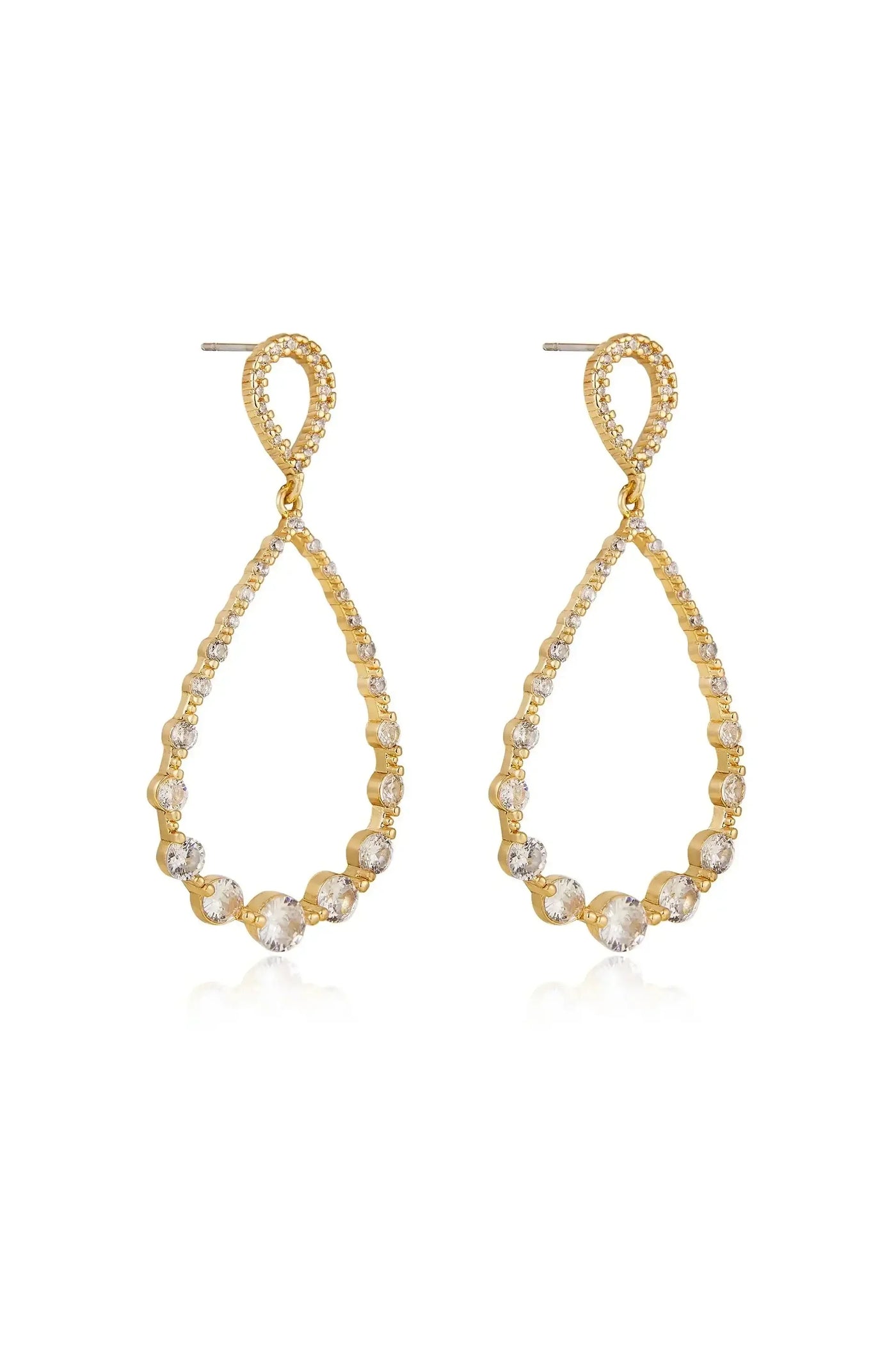 Gold teardrop earrings adorned with sparkling clear stones are displayed upright, showcasing their elegant design and reflective surfaces in a neutral background. The earrings feature a delicate loop at the top.
