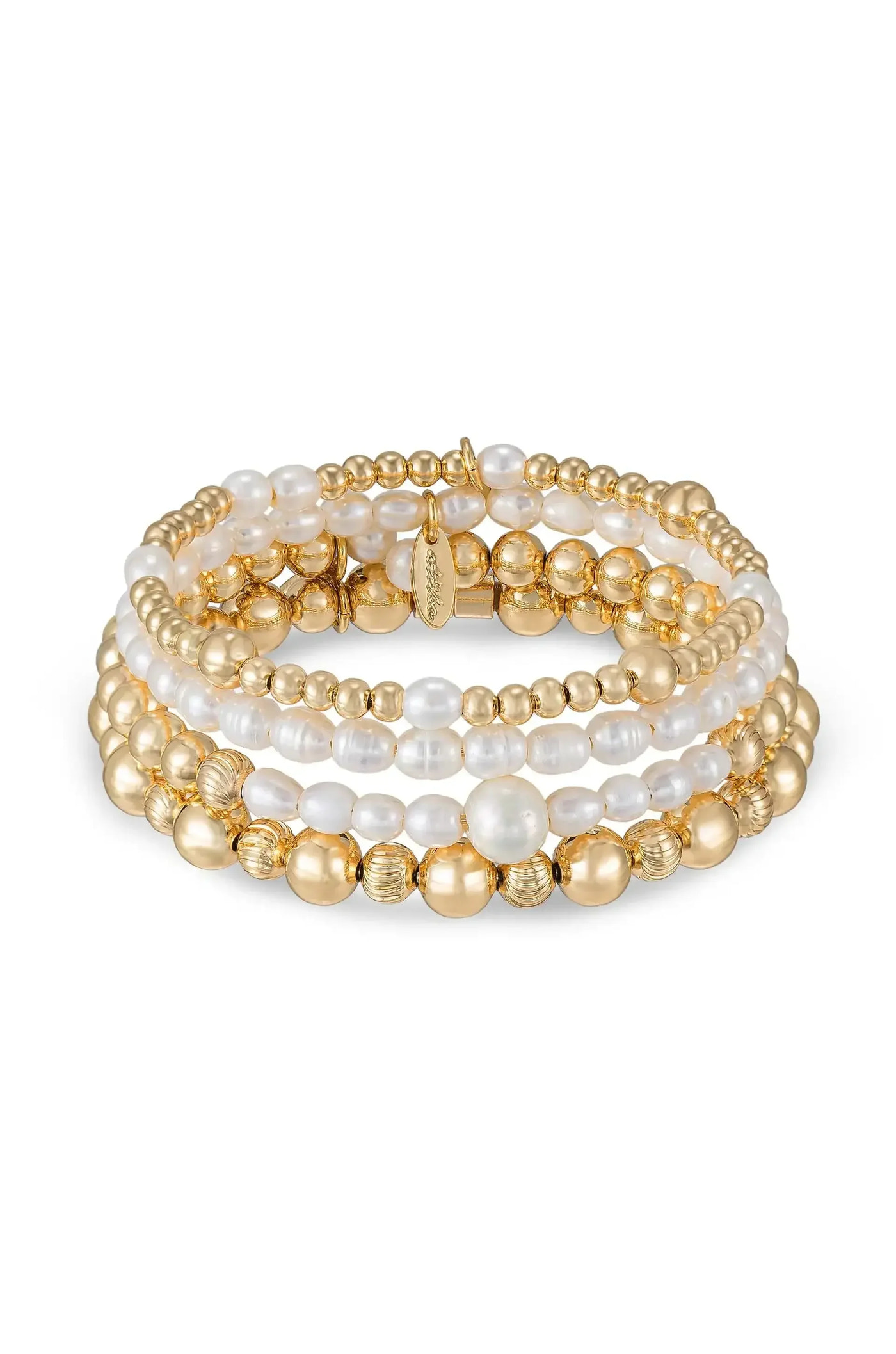 A multi-strand bracelet made of alternating golden beads and white pearls is displayed elegantly. The strands are layered together, giving a rich, textured appearance that suggests luxury and style.