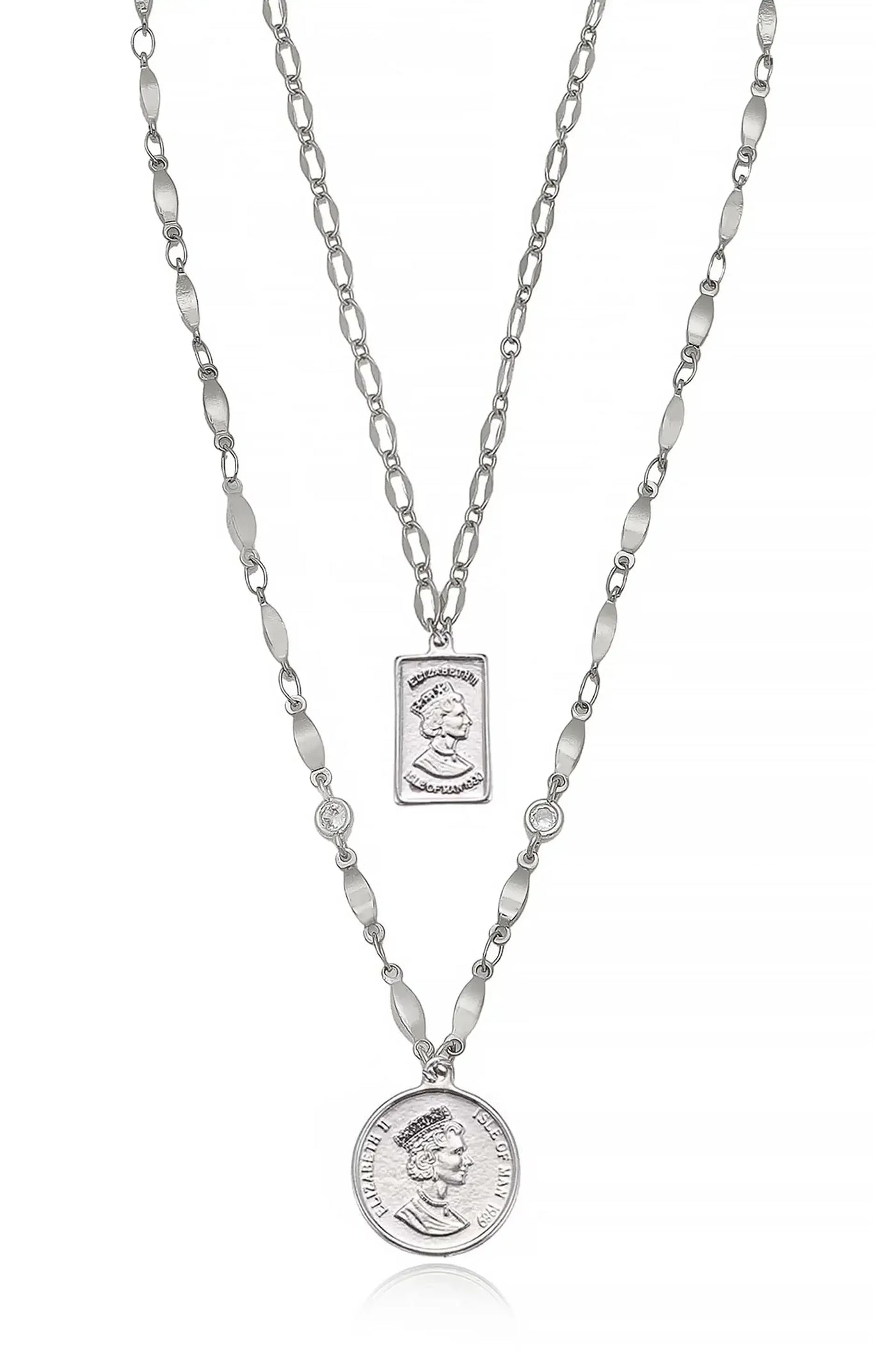 A silver necklace features two chains; one holds a rectangular pendant with a profile and the other has a round coin pendant. Both pendants depict a monarch's likeness.