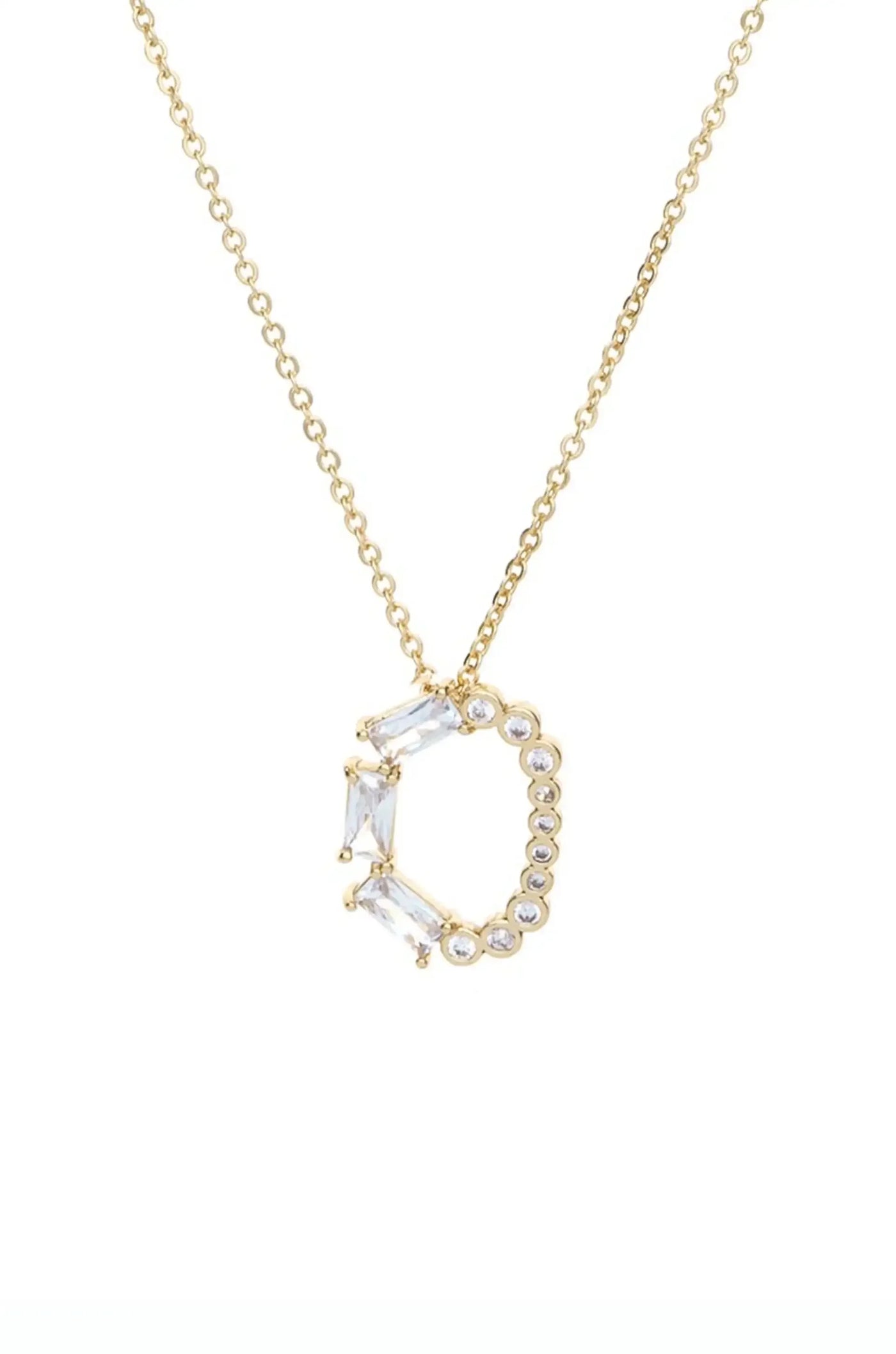 A gold necklace features a pendant shaped like the letter "C," adorned with clear gemstone accents, suspended against a plain white background, showcasing its elegant design.