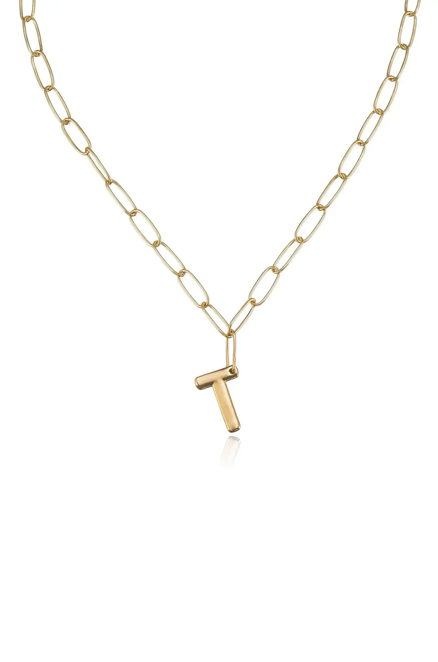 A gold chain necklace features elongated oval links holding a gold letter 'T' pendant, reflecting light against a plain white background.