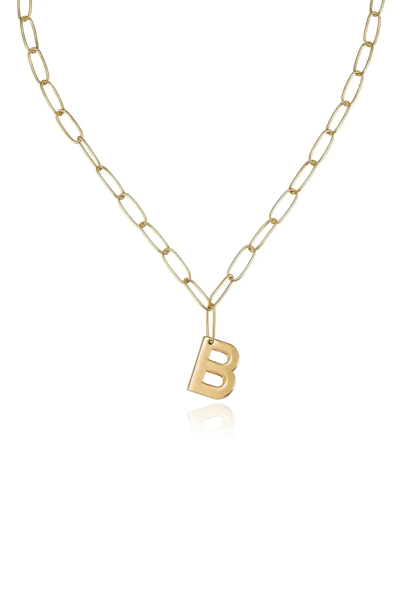 A gold chain necklace features elongated links, with a prominent "B" pendant hanging at its center. The necklace is displayed against a light background, emphasizing its shine and design.