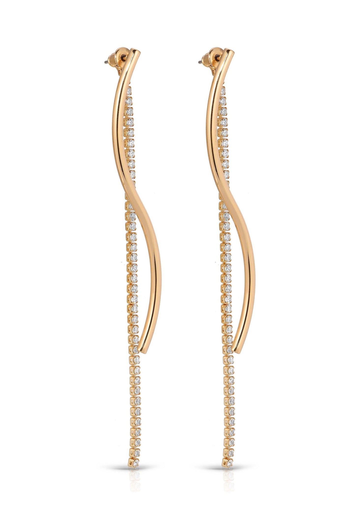 Gold earrings feature a curved design with a vertical row of sparkling stones. They dangle elegantly, reflecting light, suggesting luxury and sophistication in an unobtrusive setting.